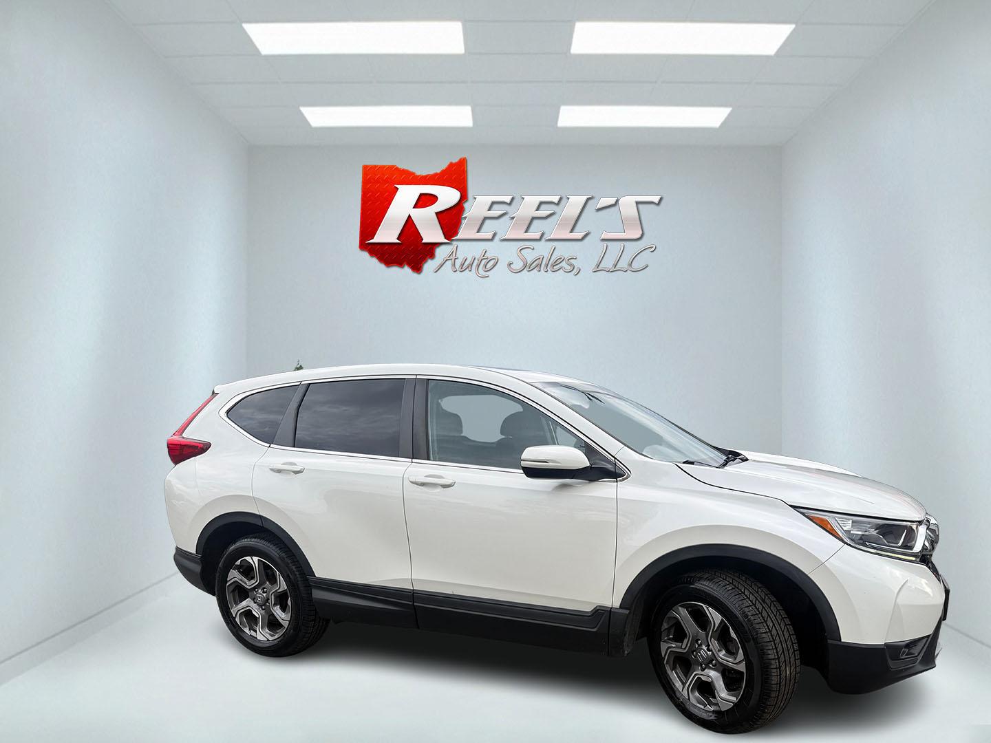 2017 White /Black Honda CR-V EX AWD (5J6RW2H52HL) with an 1.5L I4 16V DOHC TURBO engine, Automatic transmission, located at 547 E. Main St., Orwell, OH, 44076, (440) 437-5893, 41.535435, -80.847855 - 2017 Honda CR-V EX AWD – Turbo Efficiency, Loaded Safety, and Premium Features! This 2017 Honda CR-V EX AWD is a fantastic compact crossover that combines efficiency, comfort, and top-tier safety features. Powered by a responsive 1.5L Turbocharged Earth Dreams I4 engine paired with a smooth CVT t - Photo#3