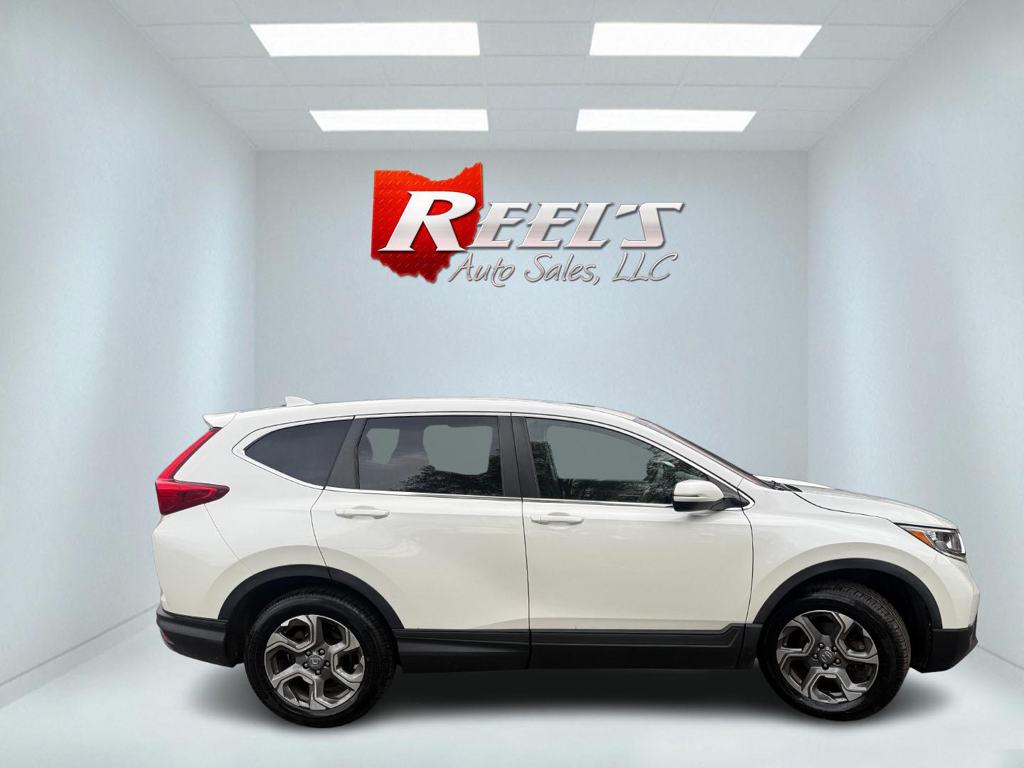 2017 White /Black Honda CR-V EX AWD (5J6RW2H52HL) with an 1.5L I4 16V DOHC TURBO engine, Automatic transmission, located at 547 E. Main St., Orwell, OH, 44076, (440) 437-5893, 41.535435, -80.847855 - 2017 Honda CR-V EX AWD – Turbo Efficiency, Loaded Safety, and Premium Features! This 2017 Honda CR-V EX AWD is a fantastic compact crossover that combines efficiency, comfort, and top-tier safety features. Powered by a responsive 1.5L Turbocharged Earth Dreams I4 engine paired with a smooth CVT t - Photo#25