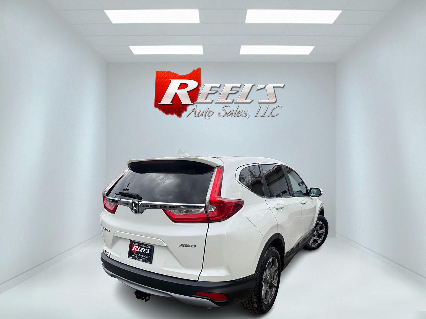 2017 White /Black Honda CR-V EX AWD (5J6RW2H52HL) with an 1.5L I4 16V DOHC TURBO engine, Automatic transmission, located at 547 E. Main St., Orwell, OH, 44076, (440) 437-5893, 41.535435, -80.847855 - 2017 Honda CR-V EX AWD – Turbo Efficiency, Loaded Safety, and Premium Features! This 2017 Honda CR-V EX AWD is a fantastic compact crossover that combines efficiency, comfort, and top-tier safety features. Powered by a responsive 1.5L Turbocharged Earth Dreams I4 engine paired with a smooth CVT t - Photo#27