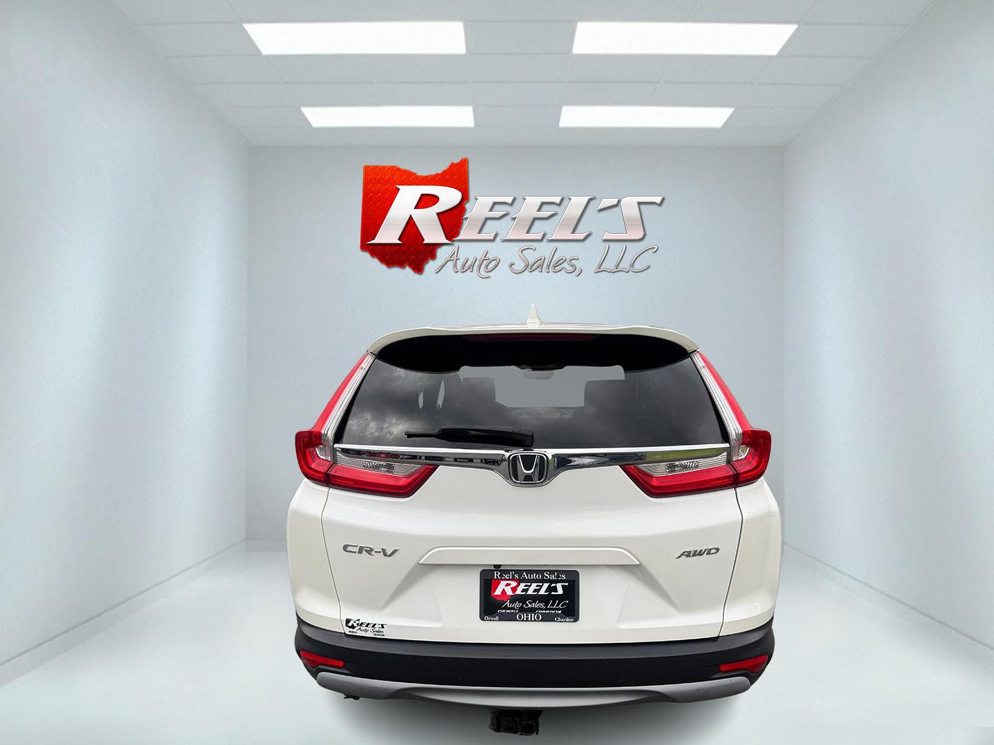2017 White /Black Honda CR-V EX AWD (5J6RW2H52HL) with an 1.5L I4 16V DOHC TURBO engine, Automatic transmission, located at 547 E. Main St., Orwell, OH, 44076, (440) 437-5893, 41.535435, -80.847855 - 2017 Honda CR-V EX AWD – Turbo Efficiency, Loaded Safety, and Premium Features! This 2017 Honda CR-V EX AWD is a fantastic compact crossover that combines efficiency, comfort, and top-tier safety features. Powered by a responsive 1.5L Turbocharged Earth Dreams I4 engine paired with a smooth CVT t - Photo#28