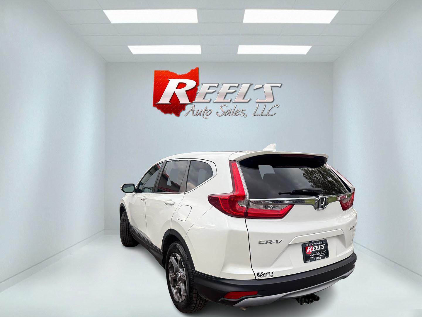 2017 White /Black Honda CR-V EX AWD (5J6RW2H52HL) with an 1.5L I4 16V DOHC TURBO engine, Automatic transmission, located at 547 E. Main St., Orwell, OH, 44076, (440) 437-5893, 41.535435, -80.847855 - 2017 Honda CR-V EX AWD – Turbo Efficiency, Loaded Safety, and Premium Features! This 2017 Honda CR-V EX AWD is a fantastic compact crossover that combines efficiency, comfort, and top-tier safety features. Powered by a responsive 1.5L Turbocharged Earth Dreams I4 engine paired with a smooth CVT t - Photo#29