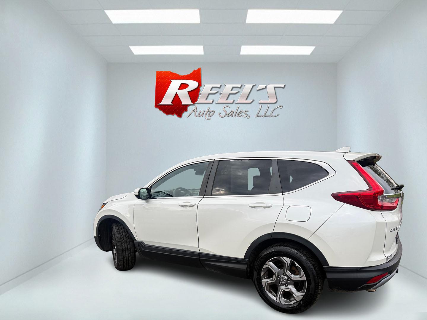 2017 White /Black Honda CR-V EX AWD (5J6RW2H52HL) with an 1.5L I4 16V DOHC TURBO engine, Automatic transmission, located at 547 E. Main St., Orwell, OH, 44076, (440) 437-5893, 41.535435, -80.847855 - 2017 Honda CR-V EX AWD – Turbo Efficiency, Loaded Safety, and Premium Features! This 2017 Honda CR-V EX AWD is a fantastic compact crossover that combines efficiency, comfort, and top-tier safety features. Powered by a responsive 1.5L Turbocharged Earth Dreams I4 engine paired with a smooth CVT t - Photo#30