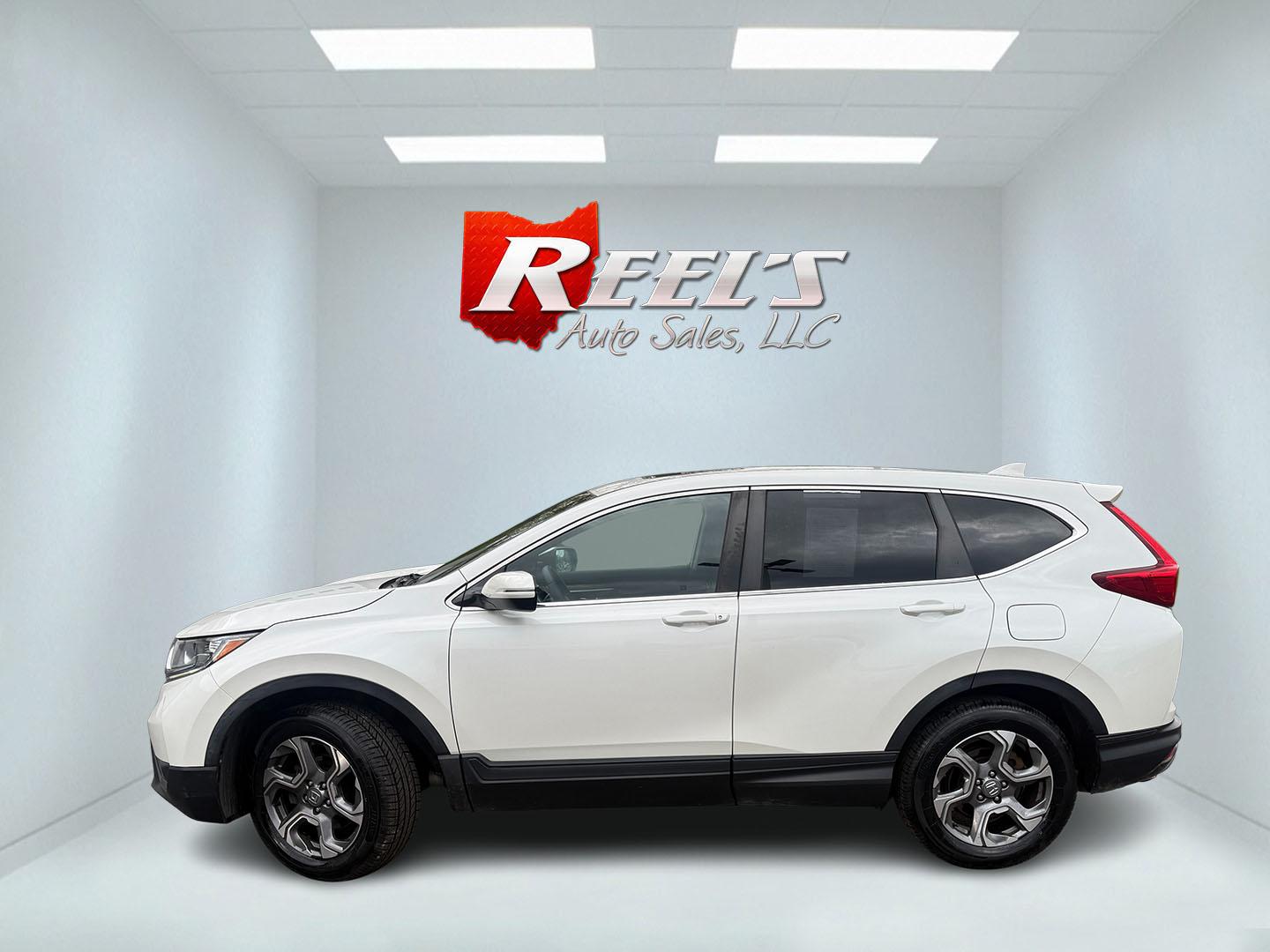 2017 White /Black Honda CR-V EX AWD (5J6RW2H52HL) with an 1.5L I4 16V DOHC TURBO engine, Automatic transmission, located at 547 E. Main St., Orwell, OH, 44076, (440) 437-5893, 41.535435, -80.847855 - 2017 Honda CR-V EX AWD – Turbo Efficiency, Loaded Safety, and Premium Features! This 2017 Honda CR-V EX AWD is a fantastic compact crossover that combines efficiency, comfort, and top-tier safety features. Powered by a responsive 1.5L Turbocharged Earth Dreams I4 engine paired with a smooth CVT t - Photo#32