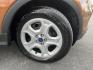 2017 Orange /Black Ford Escape S FWD (1FMCU0F7XHU) with an 2.5L I4 DOHC 16V engine, Automatic transmission, located at 11115 Chardon Rd. , Chardon, OH, 44024, (440) 214-9705, 41.580246, -81.241943 - Photo#4