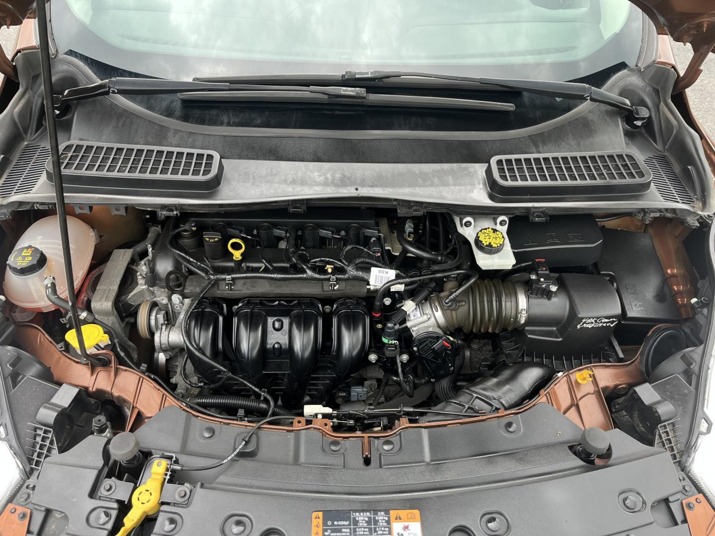 2017 Orange /Black Ford Escape S FWD (1FMCU0F7XHU) with an 2.5L I4 DOHC 16V engine, Automatic transmission, located at 11115 Chardon Rd. , Chardon, OH, 44024, (440) 214-9705, 41.580246, -81.241943 - Photo#13