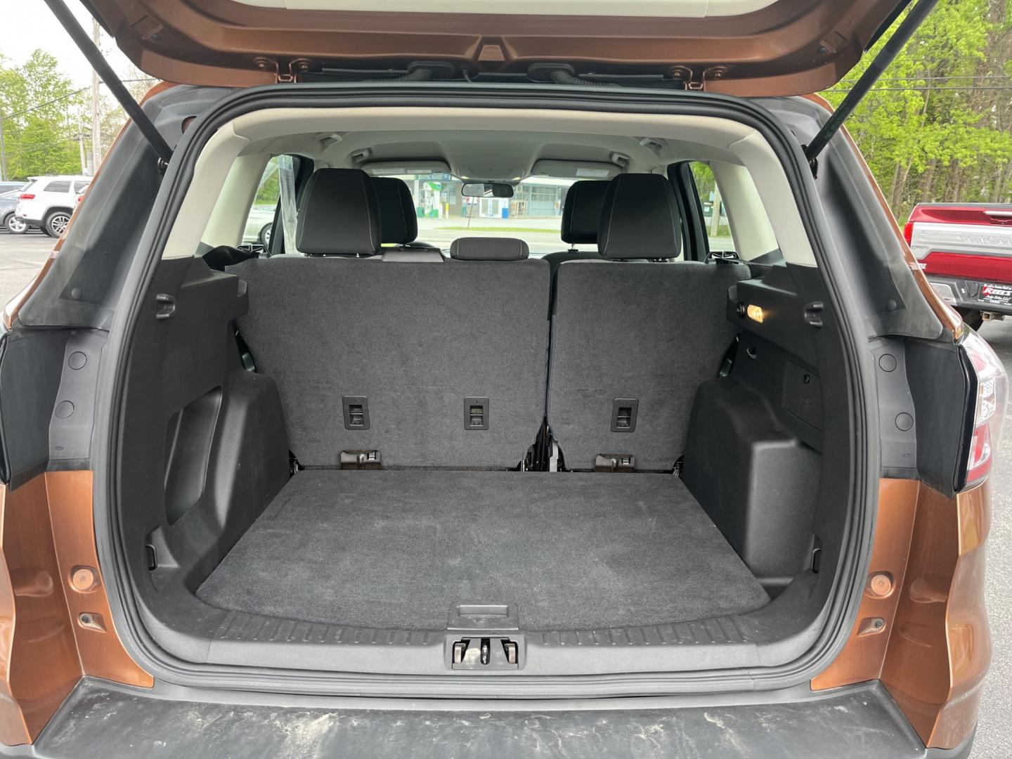 2017 Orange /Black Ford Escape S FWD (1FMCU0F7XHU) with an 2.5L I4 DOHC 16V engine, Automatic transmission, located at 11115 Chardon Rd. , Chardon, OH, 44024, (440) 214-9705, 41.580246, -81.241943 - Photo#14