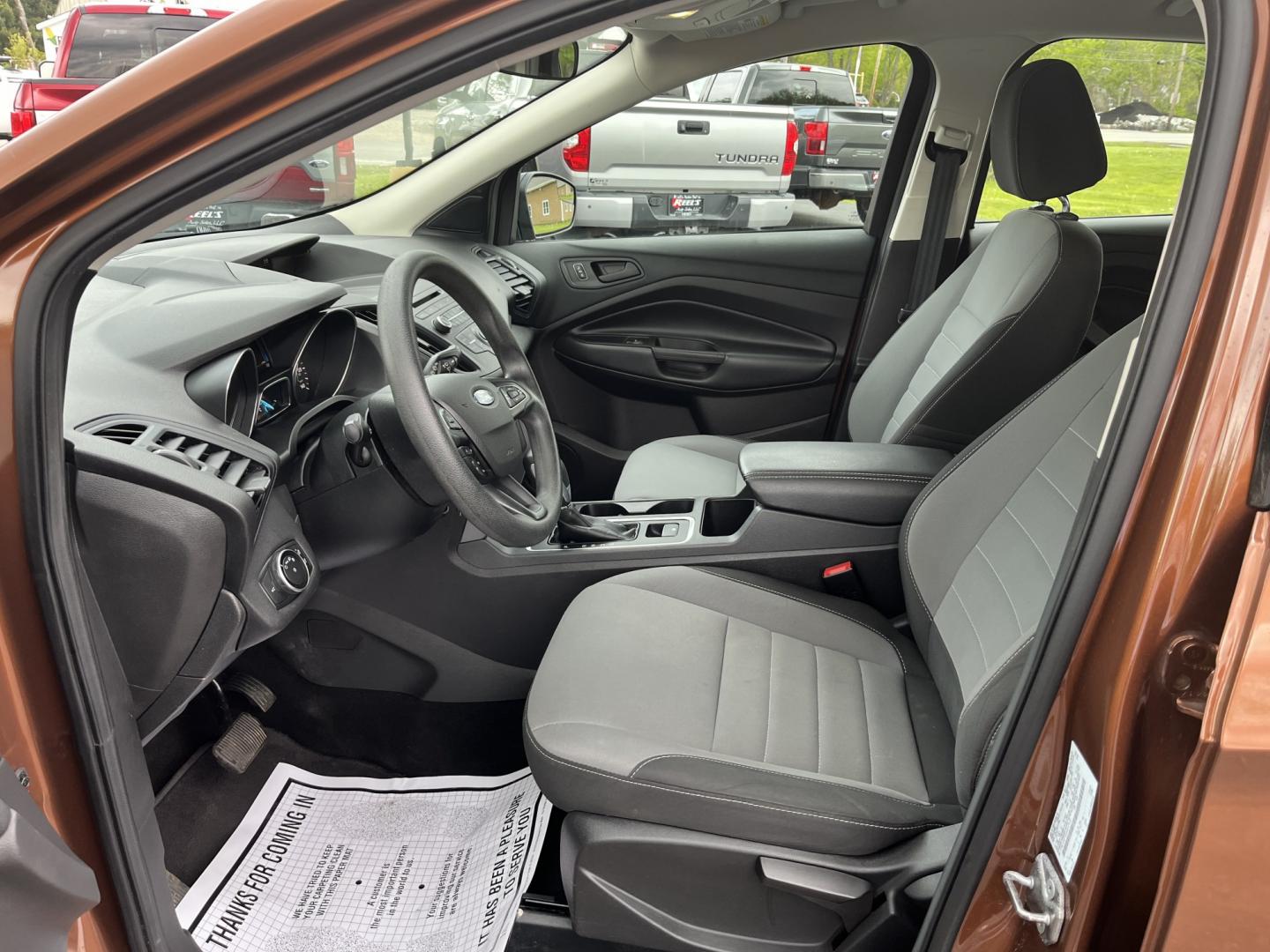 2017 Orange /Black Ford Escape S FWD (1FMCU0F7XHU) with an 2.5L I4 DOHC 16V engine, Automatic transmission, located at 11115 Chardon Rd. , Chardon, OH, 44024, (440) 214-9705, 41.580246, -81.241943 - Photo#17