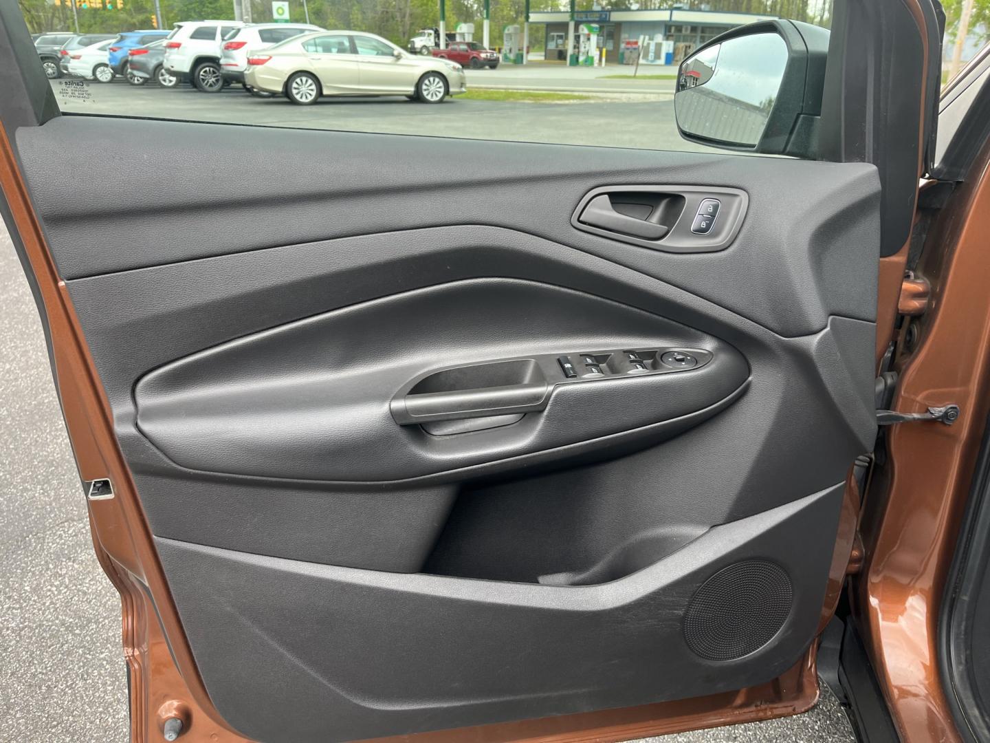 2017 Orange /Black Ford Escape S FWD (1FMCU0F7XHU) with an 2.5L I4 DOHC 16V engine, Automatic transmission, located at 11115 Chardon Rd. , Chardon, OH, 44024, (440) 214-9705, 41.580246, -81.241943 - Photo#15