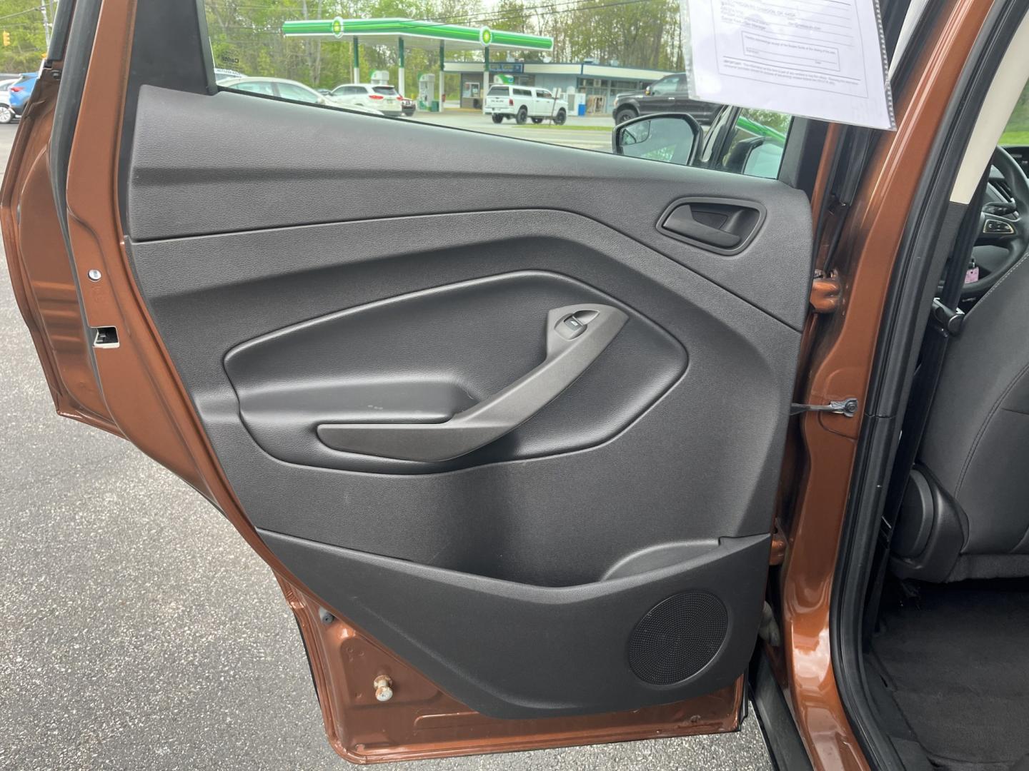 2017 Orange /Black Ford Escape S FWD (1FMCU0F7XHU) with an 2.5L I4 DOHC 16V engine, Automatic transmission, located at 11115 Chardon Rd. , Chardon, OH, 44024, (440) 214-9705, 41.580246, -81.241943 - Photo#28