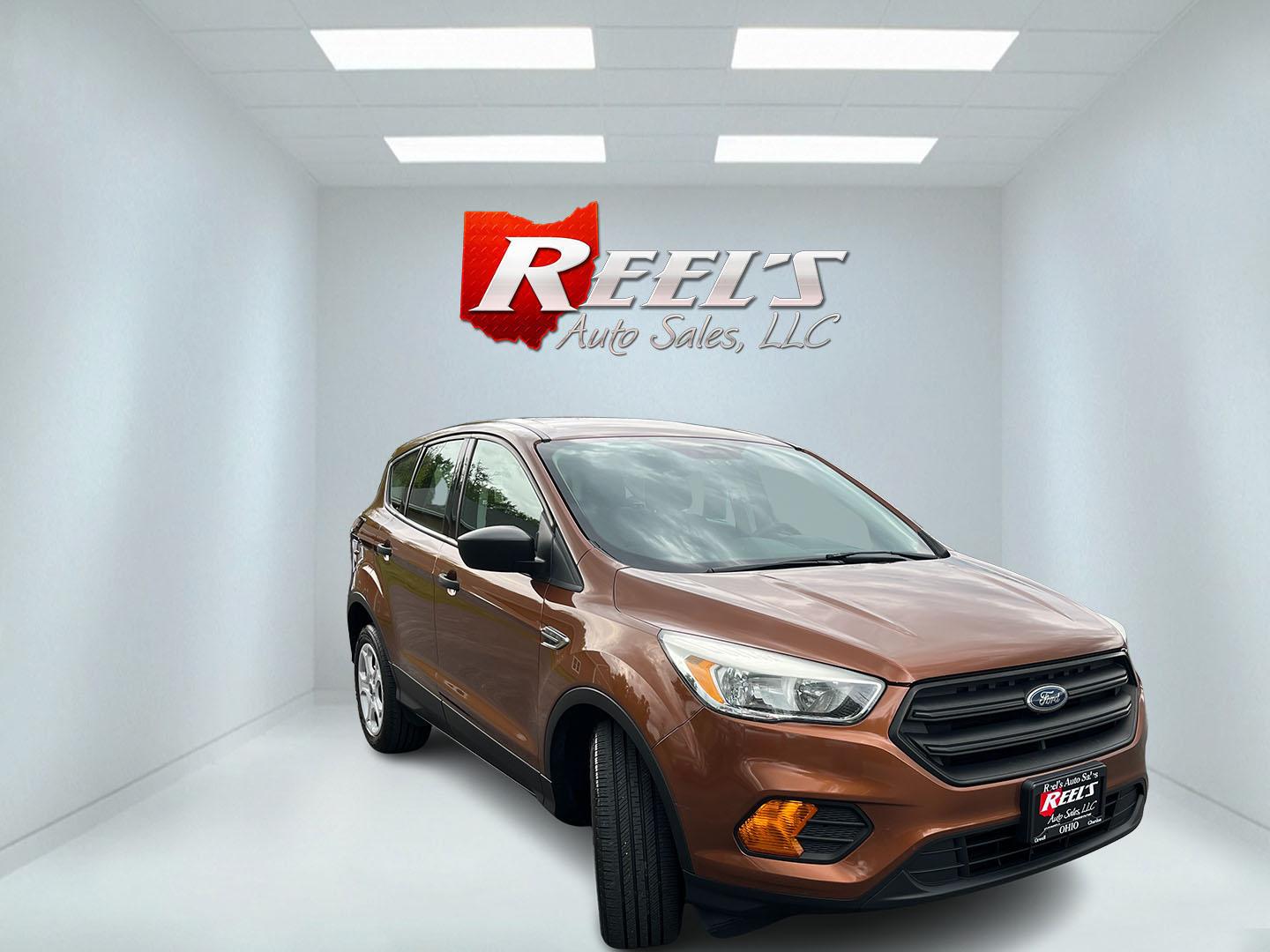 2017 Orange /Black Ford Escape S FWD (1FMCU0F7XHU) with an 2.5L I4 DOHC 16V engine, Automatic transmission, located at 11115 Chardon Rd. , Chardon, OH, 44024, (440) 214-9705, 41.580246, -81.241943 - Photo#2
