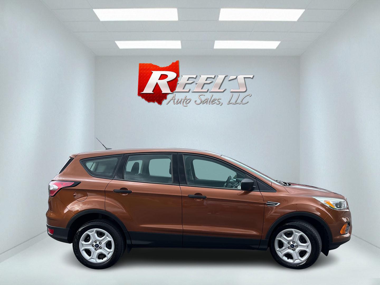 2017 Orange /Black Ford Escape S FWD (1FMCU0F7XHU) with an 2.5L I4 DOHC 16V engine, Automatic transmission, located at 11115 Chardon Rd. , Chardon, OH, 44024, (440) 214-9705, 41.580246, -81.241943 - Photo#5