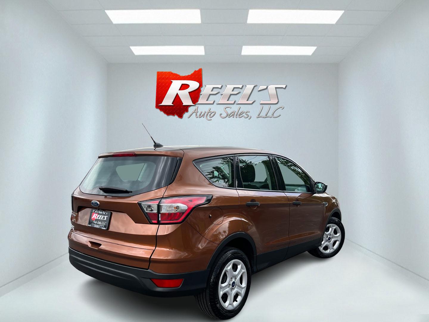2017 Orange /Black Ford Escape S FWD (1FMCU0F7XHU) with an 2.5L I4 DOHC 16V engine, Automatic transmission, located at 11115 Chardon Rd. , Chardon, OH, 44024, (440) 214-9705, 41.580246, -81.241943 - Photo#6