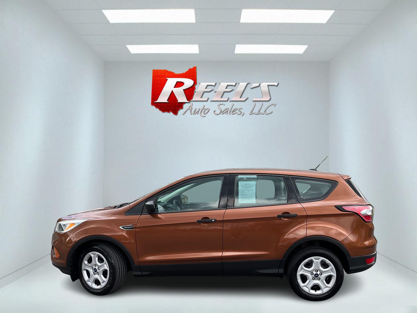 2017 Orange /Black Ford Escape S FWD (1FMCU0F7XHU) with an 2.5L I4 DOHC 16V engine, Automatic transmission, located at 11115 Chardon Rd. , Chardon, OH, 44024, (440) 214-9705, 41.580246, -81.241943 - Photo#11