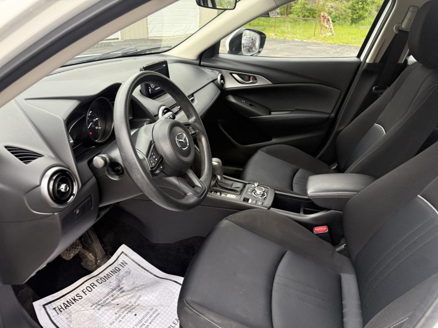 2019 White /Black Mazda CX-3 Sport AWD (JM1DKFB76K0) with an 2.0L I4 DOHC 16V engine, Automatic transmission, located at 547 E. Main St., Orwell, OH, 44076, (440) 437-5893, 41.535435, -80.847855 - 2019 Mazda CX-3 AWD – Sporty, Efficient, and Premium Compact Crossover! This 2019 Mazda CX-3 AWD is a fun-to-drive and fuel-efficient small SUV that’s packed with style and smart features. Powered by Mazda’s responsive 2.0L SkyActiv I4 engine paired with a smooth 6-speed automatic transmissio- Photo#7