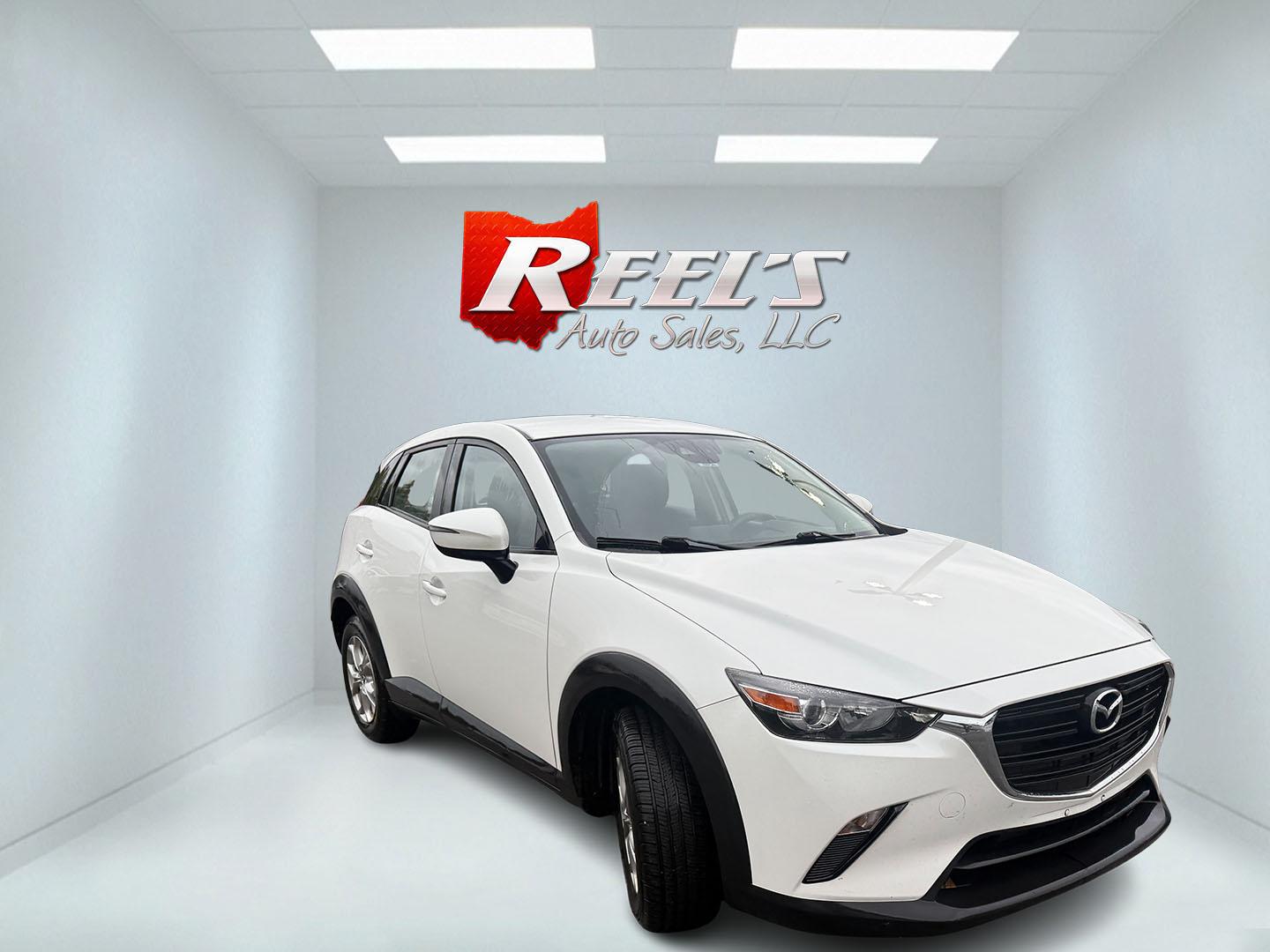 2019 White /Black Mazda CX-3 Sport AWD (JM1DKFB76K0) with an 2.0L I4 DOHC 16V engine, Automatic transmission, located at 547 E. Main St., Orwell, OH, 44076, (440) 437-5893, 41.535435, -80.847855 - 2019 Mazda CX-3 AWD – Sporty, Efficient, and Premium Compact Crossover! This 2019 Mazda CX-3 AWD is a fun-to-drive and fuel-efficient small SUV that’s packed with style and smart features. Powered by Mazda’s responsive 2.0L SkyActiv I4 engine paired with a smooth 6-speed automatic transmissio- Photo#2