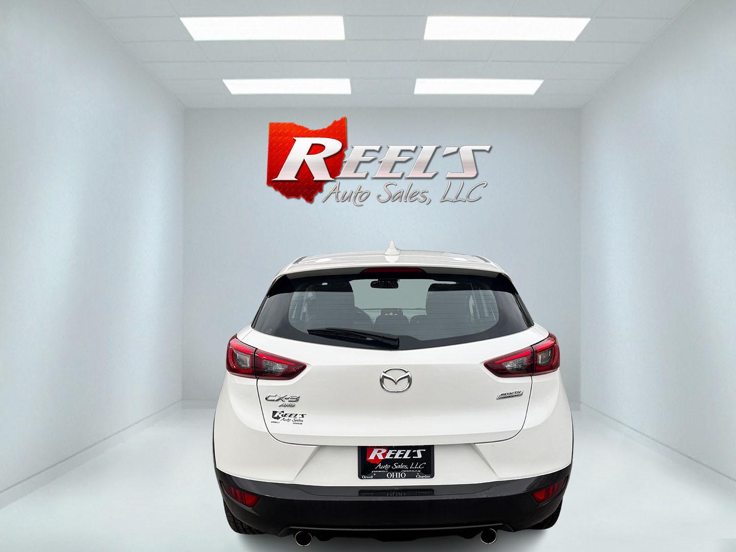 2019 White /Black Mazda CX-3 Sport AWD (JM1DKFB76K0) with an 2.0L I4 DOHC 16V engine, Automatic transmission, located at 547 E. Main St., Orwell, OH, 44076, (440) 437-5893, 41.535435, -80.847855 - 2019 Mazda CX-3 AWD – Sporty, Efficient, and Premium Compact Crossover! This 2019 Mazda CX-3 AWD is a fun-to-drive and fuel-efficient small SUV that’s packed with style and smart features. Powered by Mazda’s responsive 2.0L SkyActiv I4 engine paired with a smooth 6-speed automatic transmissio- Photo#26