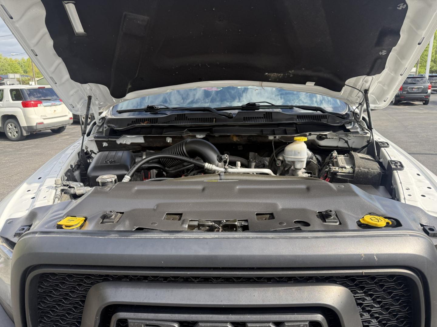 2021 White /Black RAM 1500 Classic Warlock Quad Cab 4WD (1C6RR7GT7MS) with an 5.7L V8 OHV 16V engine, Automatic transmission, located at 547 E. Main St., Orwell, OH, 44076, (440) 437-5893, 41.535435, -80.847855 - 2021 Ram 1500 Classic Warlock Quad Cab 4WD – Factory Lifted HEMI Truck with Fresh Service and Aggressive Styling! This 2021 Ram 1500 Classic Warlock Quad Cab 4WD is a tough, standout truck with factory lift and recent service work. Powered by the legendary 5.7L HEMI V8 engine paired with an 8-spe - Photo#14