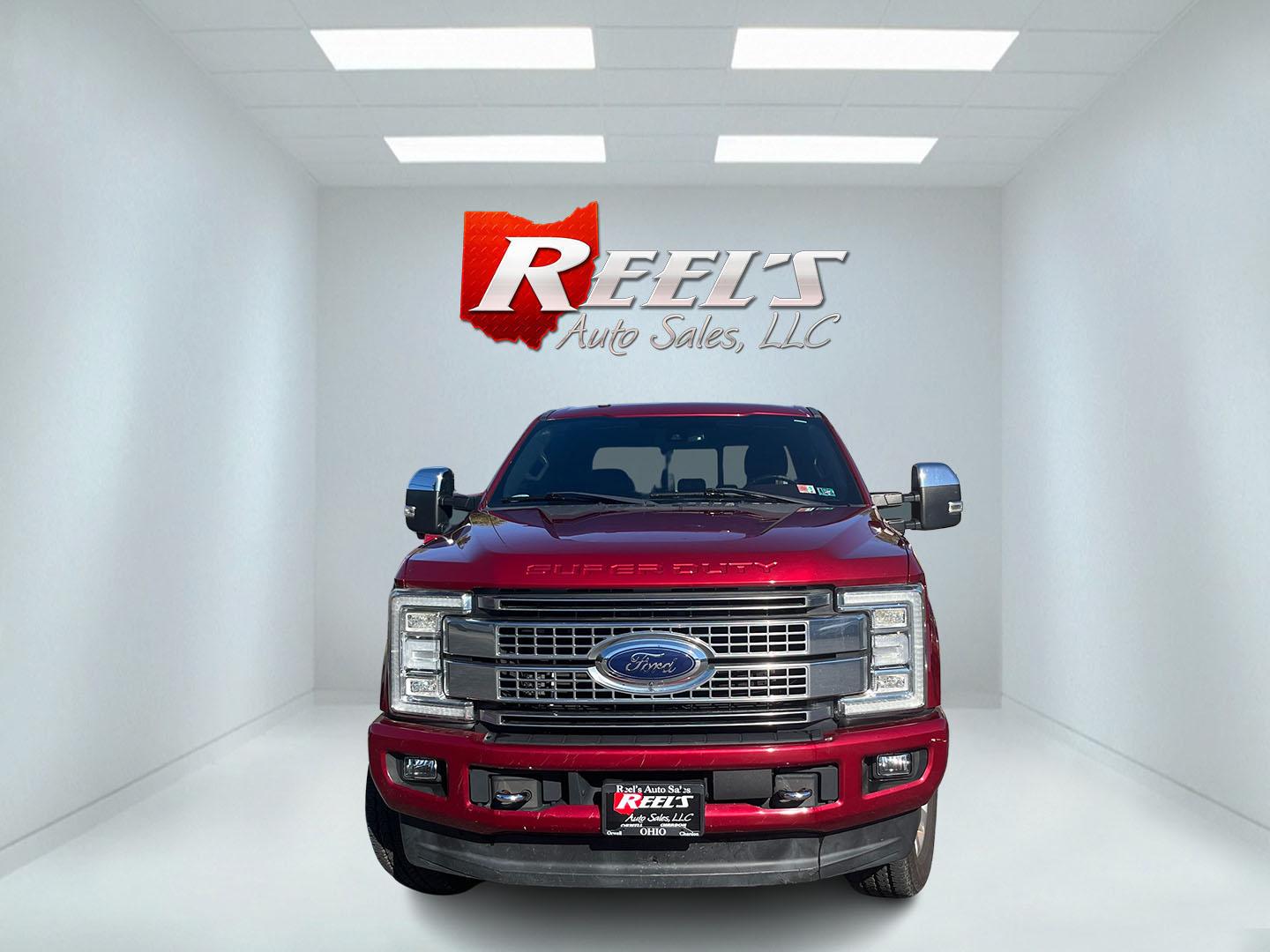 2017 Red /Black Ford F-250 SD Platinum Crew Cab 4WD (1FT7W2B65HE) with an 6.2L V8 OHV 16V engine, Automatic transmission, located at 11115 Chardon Rd. , Chardon, OH, 44024, (440) 214-9705, 41.580246, -81.241943 - 2017 Ford F-250 Super Duty Platinum Crew Cab 4WD – Loaded Luxury Heavy-Duty Truck with Massive Towing Power! This 2017 Ford F-250 Super Duty Platinum Crew Cab 4WD is a top-of-the-line heavy-duty truck that combines western luxury with serious work capability. Powered by the strong 6.2L V8 engine - Photo#1