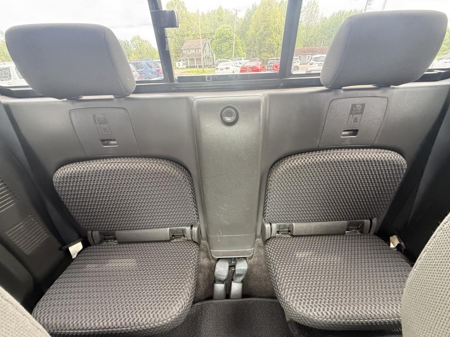 2014 Black /Gray Nissan Frontier SV King Cab 5AT 4WD (1N6AD0CW4EN) with an 4.0L V6 DOHC 24V engine, Automatic transmission, located at 11115 Chardon Rd. , Chardon, OH, 44024, (440) 214-9705, 41.580246, -81.241943 - 2014 Nissan Frontier SV King Cab 4WD – Tough, Reliable Midsize Truck with Fresh Service! This 2014 Nissan Frontier SV King Cab 4WD is a rugged and dependable midsize pickup that’s built to last and ready for work or weekend adventures. Powered by the proven 4.0L V6 engine paired with a durable - Photo#21