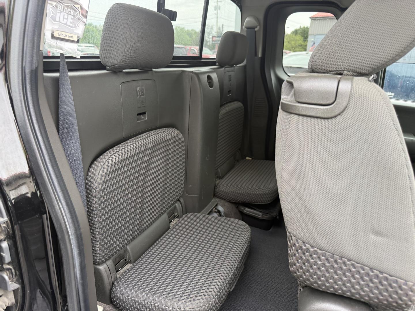 2014 Black /Gray Nissan Frontier SV King Cab 5AT 4WD (1N6AD0CW4EN) with an 4.0L V6 DOHC 24V engine, Automatic transmission, located at 11115 Chardon Rd. , Chardon, OH, 44024, (440) 214-9705, 41.580246, -81.241943 - 2014 Nissan Frontier SV King Cab 4WD – Tough, Reliable Midsize Truck with Fresh Service! This 2014 Nissan Frontier SV King Cab 4WD is a rugged and dependable midsize pickup that’s built to last and ready for work or weekend adventures. Powered by the proven 4.0L V6 engine paired with a durable - Photo#33