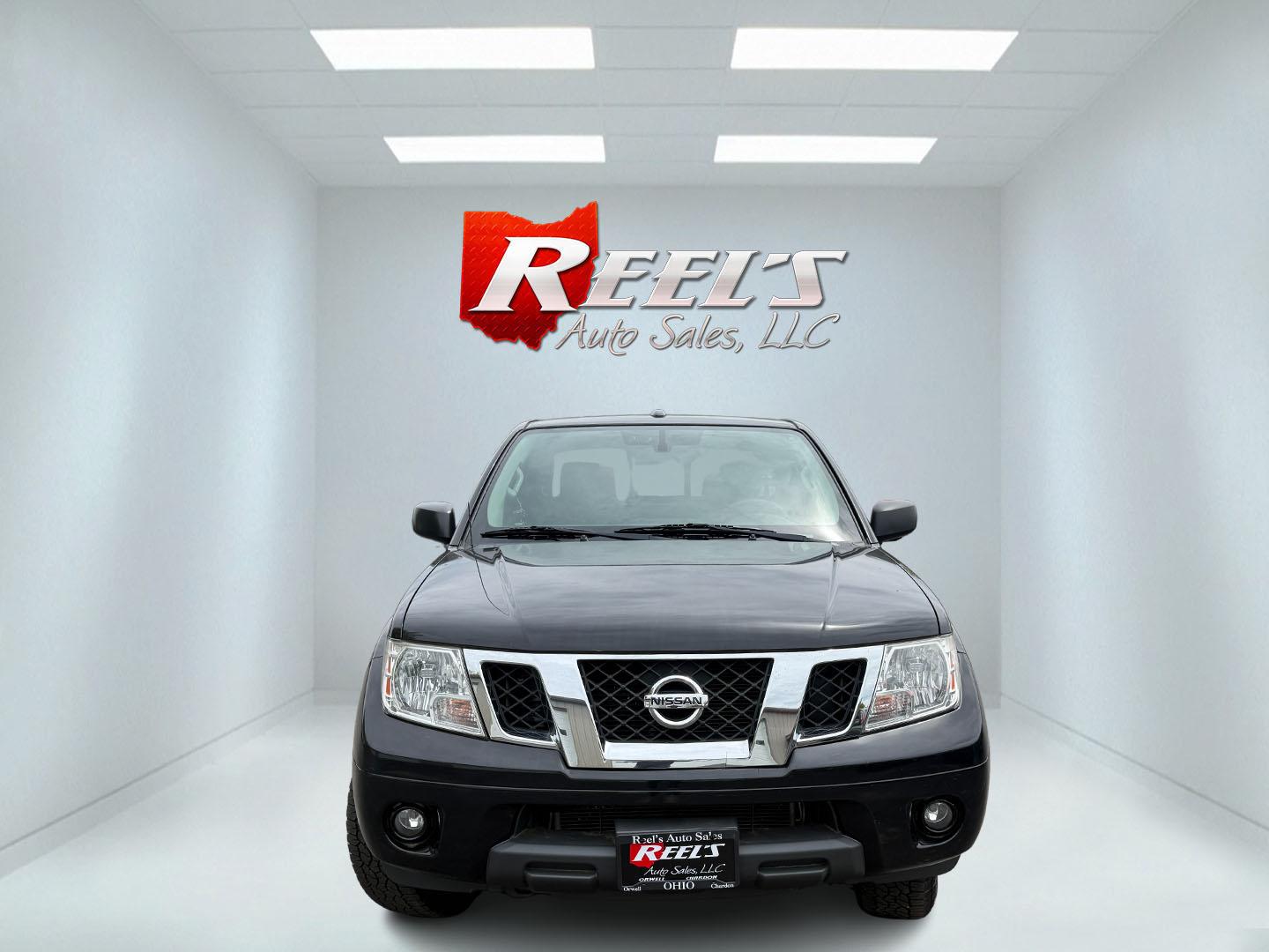2014 Black /Gray Nissan Frontier SV King Cab 5AT 4WD (1N6AD0CW4EN) with an 4.0L V6 DOHC 24V engine, Automatic transmission, located at 11115 Chardon Rd. , Chardon, OH, 44024, (440) 214-9705, 41.580246, -81.241943 - 2014 Nissan Frontier SV King Cab 4WD – Tough, Reliable Midsize Truck with Fresh Service! This 2014 Nissan Frontier SV King Cab 4WD is a rugged and dependable midsize pickup that’s built to last and ready for work or weekend adventures. Powered by the proven 4.0L V6 engine paired with a durable - Photo#1