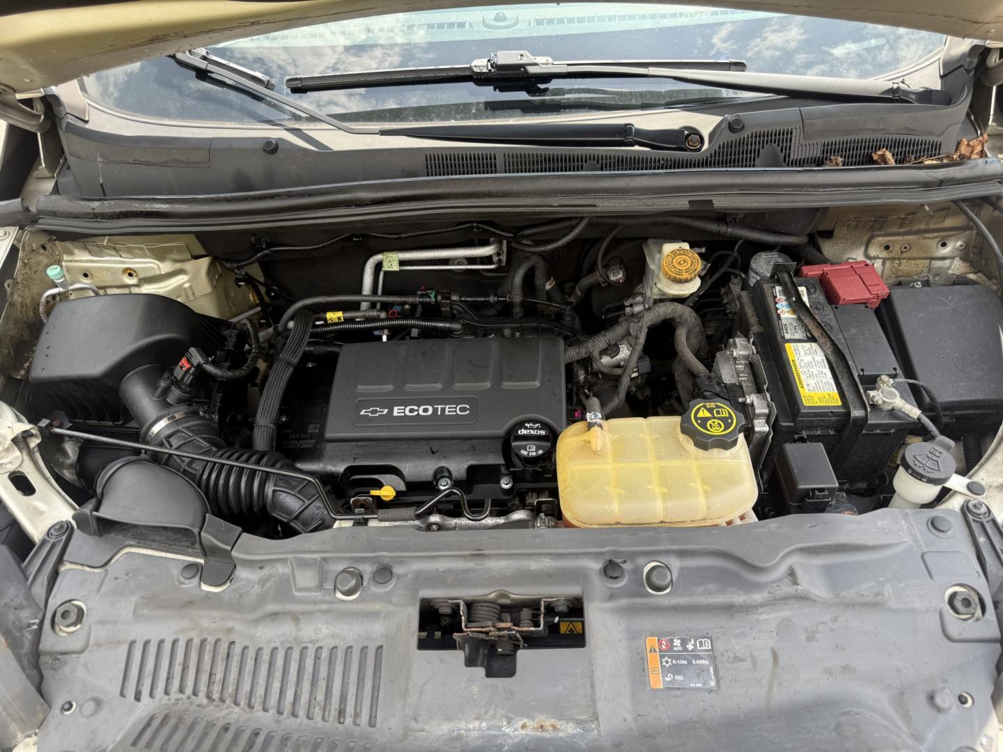 2016 Gold /Black Chevrolet Trax LT AWD (3GNCJPSB0GL) with an 1.4L I4 DOHC 16V TURBO engine, Automatic transmission, located at 547 E. Main St., Orwell, OH, 44076, (440) 437-5893, 41.535435, -80.847855 - 2016 Chevrolet Trax LT AWD – Turbo Efficiency, Fresh Service, and All-Weather Grip! This sharp 2016 Chevrolet Trax LT AWD is a compact, fuel-efficient crossover that’s easy to drive and ready to go. Powered by a peppy 1.4L Turbocharged EcoTec I4 engine paired with a smooth 6-speed automatic tra - Photo#6