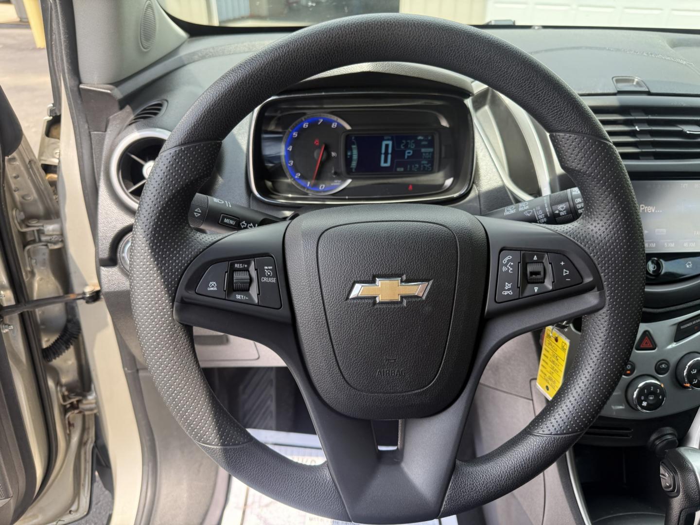 2016 Gold /Black Chevrolet Trax LT AWD (3GNCJPSB0GL) with an 1.4L I4 DOHC 16V TURBO engine, Automatic transmission, located at 547 E. Main St., Orwell, OH, 44076, (440) 437-5893, 41.535435, -80.847855 - 2016 Chevrolet Trax LT AWD – Turbo Efficiency, Fresh Service, and All-Weather Grip! This sharp 2016 Chevrolet Trax LT AWD is a compact, fuel-efficient crossover that’s easy to drive and ready to go. Powered by a peppy 1.4L Turbocharged EcoTec I4 engine paired with a smooth 6-speed automatic tra - Photo#13
