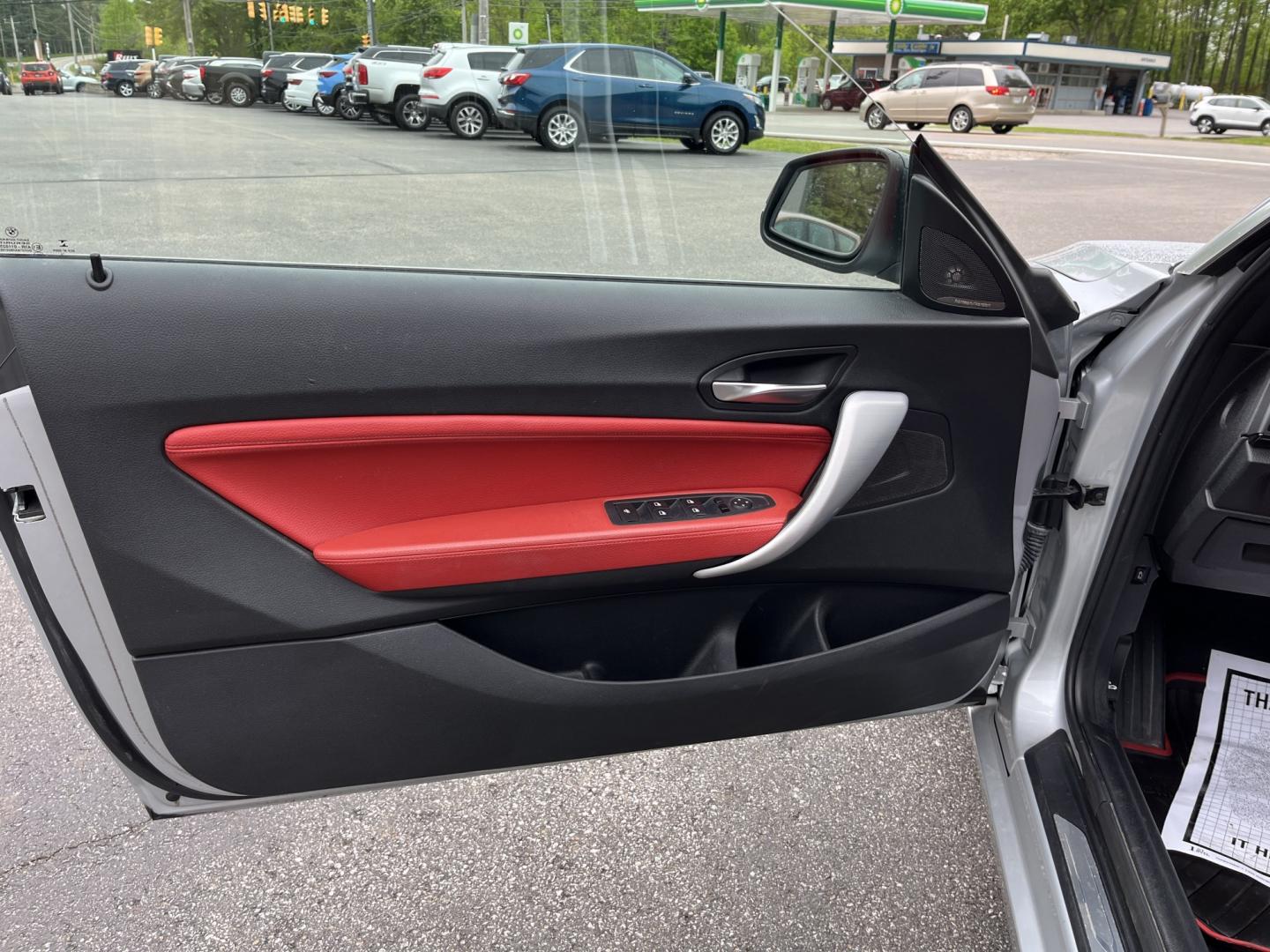 2015 Silver /Red BMW 2-Series 228xi Convertible (WBA1K7C55FV) with an 2.0L I4 DOHC 16V Turbo engine, Automatic transmission, located at 11115 Chardon Rd. , Chardon, OH, 44024, (440) 214-9705, 41.580246, -81.241943 - 2015 BMW 228i xDrive Convertible – Sporty Turbo Drop-Top with Premium Red Leather and xDrive Confidence! This 2015 BMW 228i xDrive Convertible is a fun, stylish, and capable premium convertible that offers the perfect blend of performance and open-air enjoyment. Powered by a responsive 2.0L Turbo - Photo#16