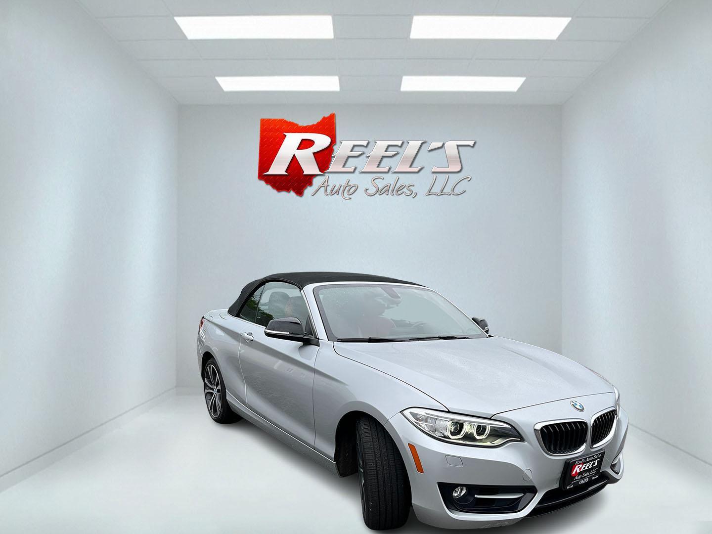 2015 Silver /Red BMW 2-Series 228xi Convertible (WBA1K7C55FV) with an 2.0L I4 DOHC 16V Turbo engine, Automatic transmission, located at 11115 Chardon Rd. , Chardon, OH, 44024, (440) 214-9705, 41.580246, -81.241943 - 2015 BMW 228i xDrive Convertible – Sporty Turbo Drop-Top with Premium Red Leather and xDrive Confidence! This 2015 BMW 228i xDrive Convertible is a fun, stylish, and capable premium convertible that offers the perfect blend of performance and open-air enjoyment. Powered by a responsive 2.0L Turbo - Photo#3