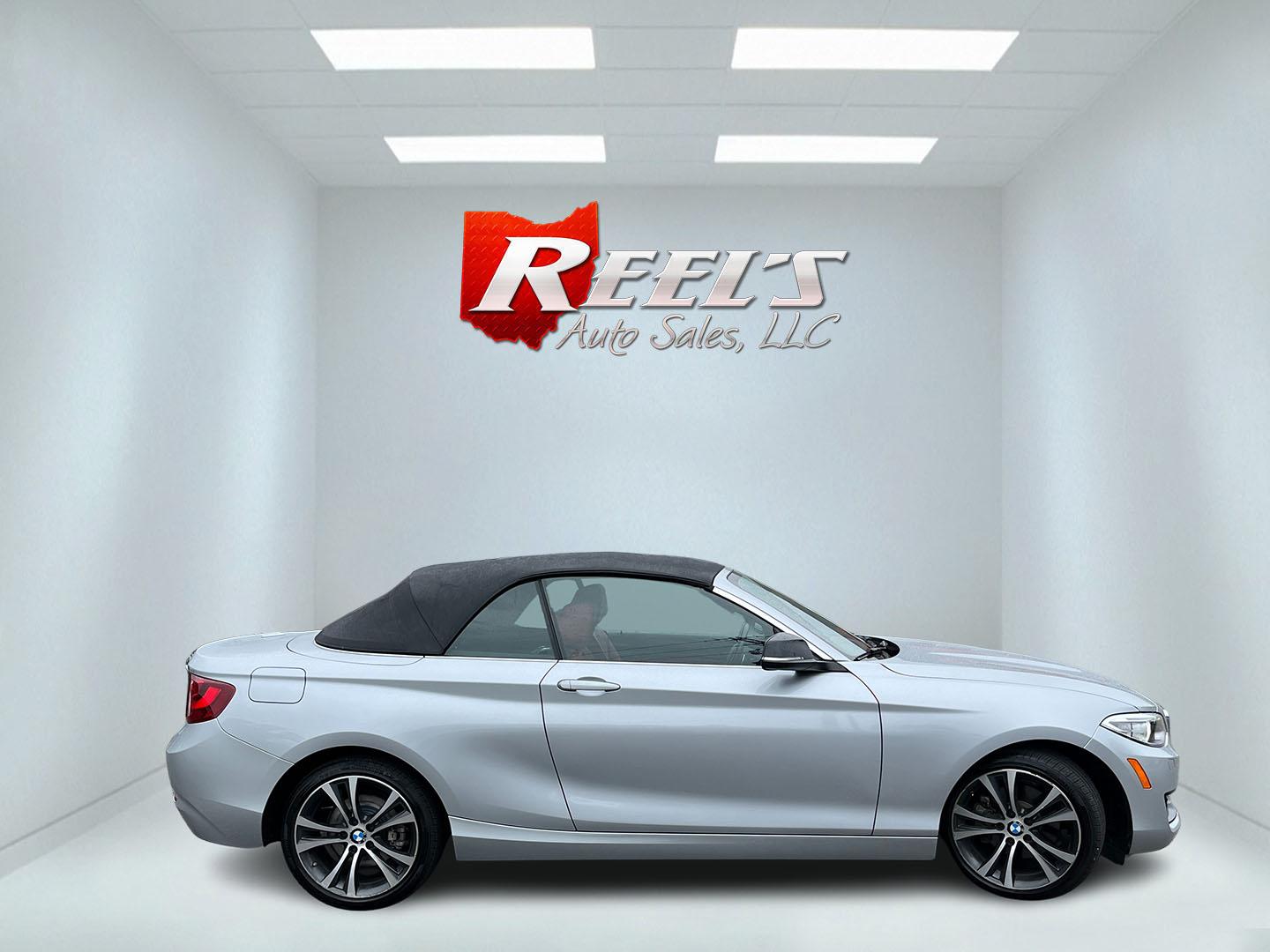 2015 Silver /Red BMW 2-Series 228xi Convertible (WBA1K7C55FV) with an 2.0L I4 DOHC 16V Turbo engine, Automatic transmission, located at 11115 Chardon Rd. , Chardon, OH, 44024, (440) 214-9705, 41.580246, -81.241943 - 2015 BMW 228i xDrive Convertible – Sporty Turbo Drop-Top with Premium Red Leather and xDrive Confidence! This 2015 BMW 228i xDrive Convertible is a fun, stylish, and capable premium convertible that offers the perfect blend of performance and open-air enjoyment. Powered by a responsive 2.0L Turbo - Photo#6