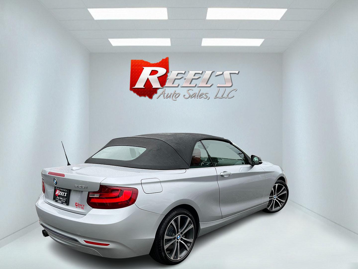 2015 Silver /Red BMW 2-Series 228xi Convertible (WBA1K7C55FV) with an 2.0L I4 DOHC 16V Turbo engine, Automatic transmission, located at 11115 Chardon Rd. , Chardon, OH, 44024, (440) 214-9705, 41.580246, -81.241943 - 2015 BMW 228i xDrive Convertible – Sporty Turbo Drop-Top with Premium Red Leather and xDrive Confidence! This 2015 BMW 228i xDrive Convertible is a fun, stylish, and capable premium convertible that offers the perfect blend of performance and open-air enjoyment. Powered by a responsive 2.0L Turbo - Photo#7