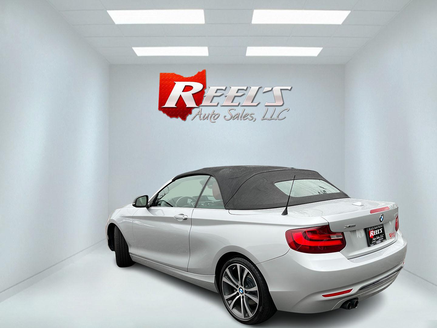 2015 Silver /Red BMW 2-Series 228xi Convertible (WBA1K7C55FV) with an 2.0L I4 DOHC 16V Turbo engine, Automatic transmission, located at 11115 Chardon Rd. , Chardon, OH, 44024, (440) 214-9705, 41.580246, -81.241943 - 2015 BMW 228i xDrive Convertible – Sporty Turbo Drop-Top with Premium Red Leather and xDrive Confidence! This 2015 BMW 228i xDrive Convertible is a fun, stylish, and capable premium convertible that offers the perfect blend of performance and open-air enjoyment. Powered by a responsive 2.0L Turbo - Photo#10