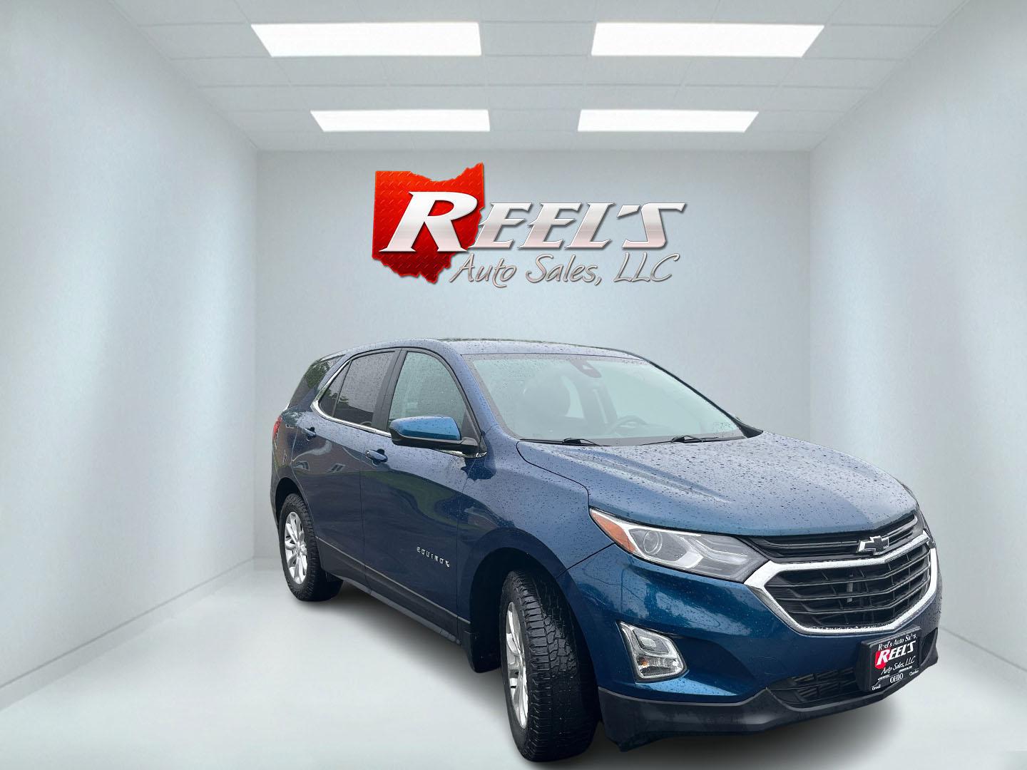 2021 Blue /Black Chevrolet Equinox LT AWD (3GNAXUEV5ML) with an 1.5L I4 DOHC 16V TURBO engine, Automatic transmission, located at 11115 Chardon Rd. , Chardon, OH, 44024, (440) 214-9705, 41.580246, -81.241943 - 2021 Chevrolet Equinox LT AWD – Efficient Turbo Crossover with Modern Safety and Comfort! This 2021 Chevrolet Equinox LT AWD is a sharp, well-equipped compact SUV that’s perfect for daily driving and family needs. Powered by a responsive 1.5L Turbocharged EcoTec I4 engine paired with a smooth 6 - Photo#2