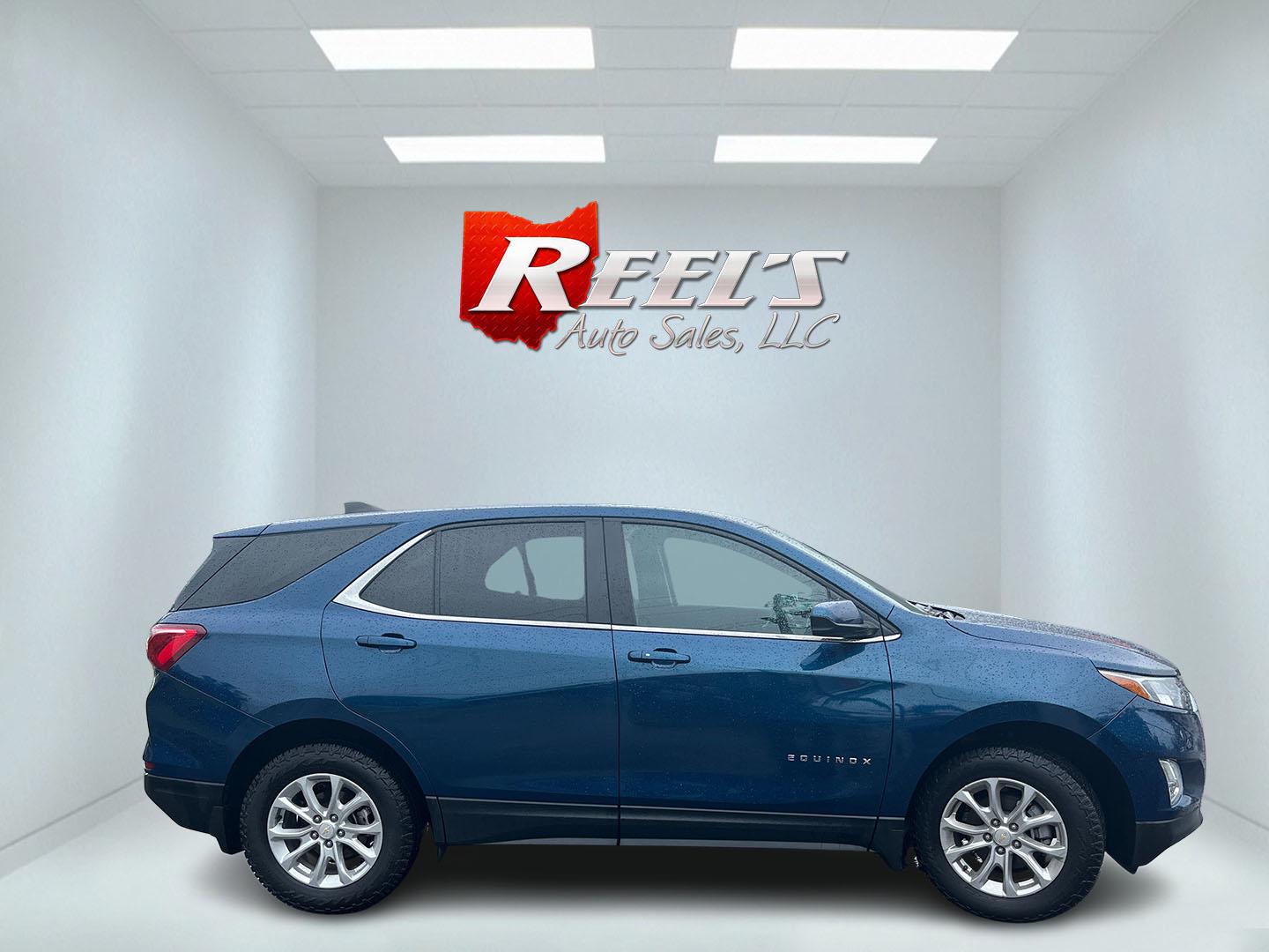 2021 Blue /Black Chevrolet Equinox LT AWD (3GNAXUEV5ML) with an 1.5L I4 DOHC 16V TURBO engine, Automatic transmission, located at 11115 Chardon Rd. , Chardon, OH, 44024, (440) 214-9705, 41.580246, -81.241943 - 2021 Chevrolet Equinox LT AWD – Efficient Turbo Crossover with Modern Safety and Comfort! This 2021 Chevrolet Equinox LT AWD is a sharp, well-equipped compact SUV that’s perfect for daily driving and family needs. Powered by a responsive 1.5L Turbocharged EcoTec I4 engine paired with a smooth 6 - Photo#5