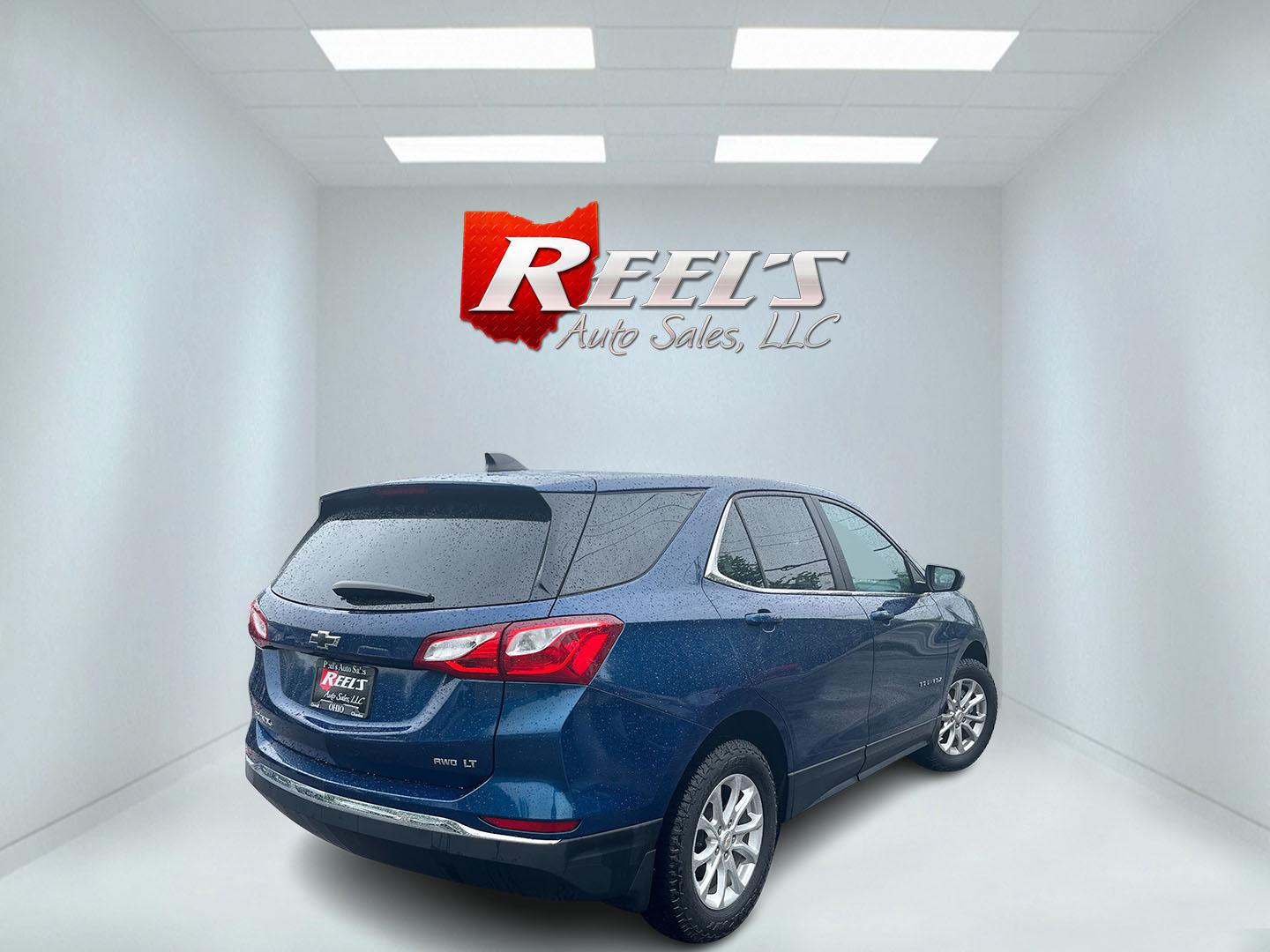 2021 Blue /Black Chevrolet Equinox LT AWD (3GNAXUEV5ML) with an 1.5L I4 DOHC 16V TURBO engine, Automatic transmission, located at 11115 Chardon Rd. , Chardon, OH, 44024, (440) 214-9705, 41.580246, -81.241943 - 2021 Chevrolet Equinox LT AWD – Efficient Turbo Crossover with Modern Safety and Comfort! This 2021 Chevrolet Equinox LT AWD is a sharp, well-equipped compact SUV that’s perfect for daily driving and family needs. Powered by a responsive 1.5L Turbocharged EcoTec I4 engine paired with a smooth 6 - Photo#6