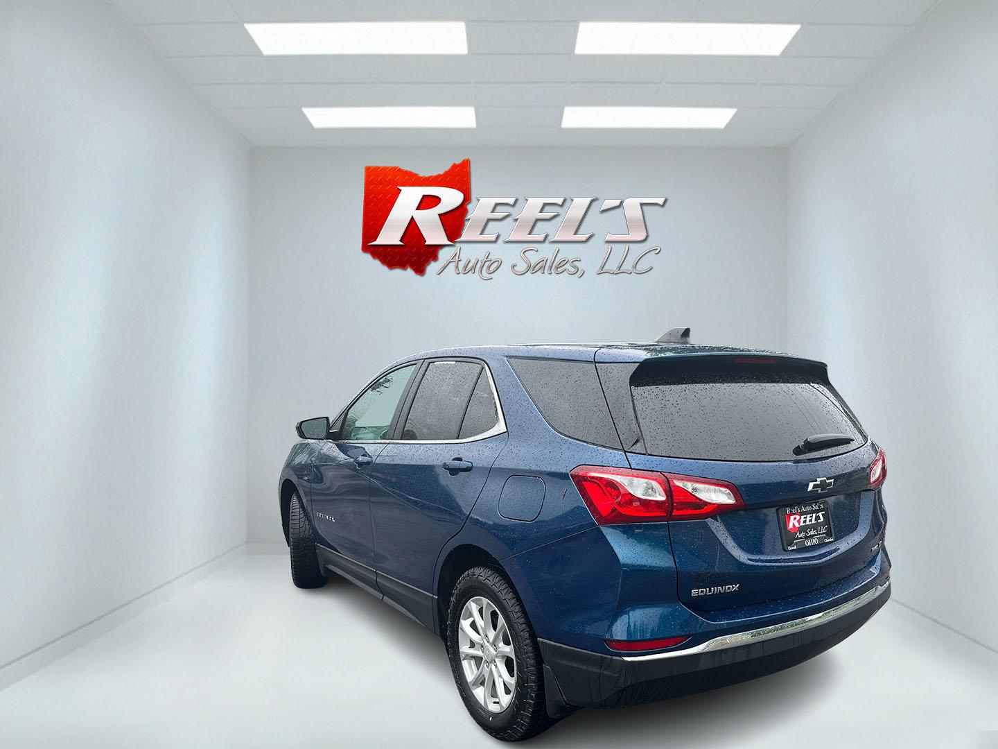 2021 Blue /Black Chevrolet Equinox LT AWD (3GNAXUEV5ML) with an 1.5L I4 DOHC 16V TURBO engine, Automatic transmission, located at 11115 Chardon Rd. , Chardon, OH, 44024, (440) 214-9705, 41.580246, -81.241943 - 2021 Chevrolet Equinox LT AWD – Efficient Turbo Crossover with Modern Safety and Comfort! This 2021 Chevrolet Equinox LT AWD is a sharp, well-equipped compact SUV that’s perfect for daily driving and family needs. Powered by a responsive 1.5L Turbocharged EcoTec I4 engine paired with a smooth 6 - Photo#9
