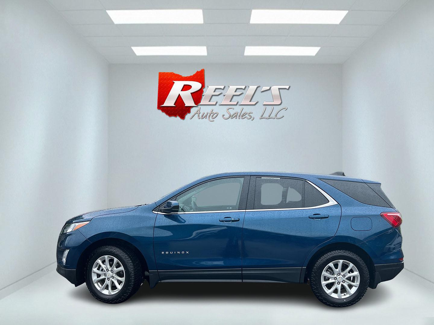 2021 Blue /Black Chevrolet Equinox LT AWD (3GNAXUEV5ML) with an 1.5L I4 DOHC 16V TURBO engine, Automatic transmission, located at 11115 Chardon Rd. , Chardon, OH, 44024, (440) 214-9705, 41.580246, -81.241943 - 2021 Chevrolet Equinox LT AWD – Efficient Turbo Crossover with Modern Safety and Comfort! This 2021 Chevrolet Equinox LT AWD is a sharp, well-equipped compact SUV that’s perfect for daily driving and family needs. Powered by a responsive 1.5L Turbocharged EcoTec I4 engine paired with a smooth 6 - Photo#11