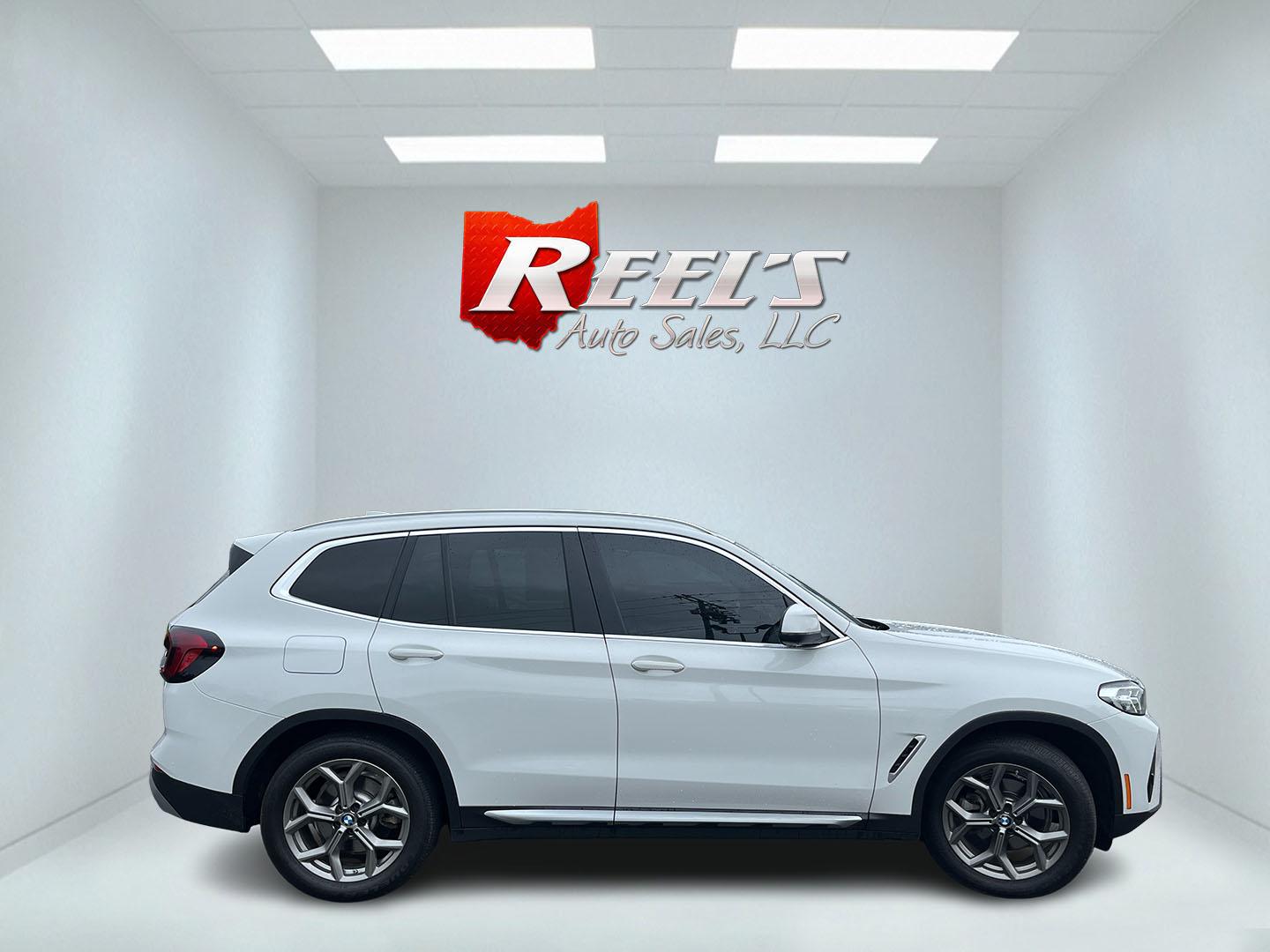 2022 White /Black BMW X3 xDrive30i (5UX53DP02N9) with an 2.0L I4 DOHC 16V Turbo engine, Automatic transmission, located at 11115 Chardon Rd. , Chardon, OH, 44024, (440) 214-9705, 41.580246, -81.241943 - 2022 BMW X3 xDrive30i – Premium Compact Luxury SUV with Turbo Power and Alpine White Style! This 2022 BMW X3 xDrive30i is a refined and sporty luxury crossover that offers the perfect balance of performance, comfort, and versatility. Powered by a responsive 2.0L Turbocharged I4 engine paired with - Photo#5