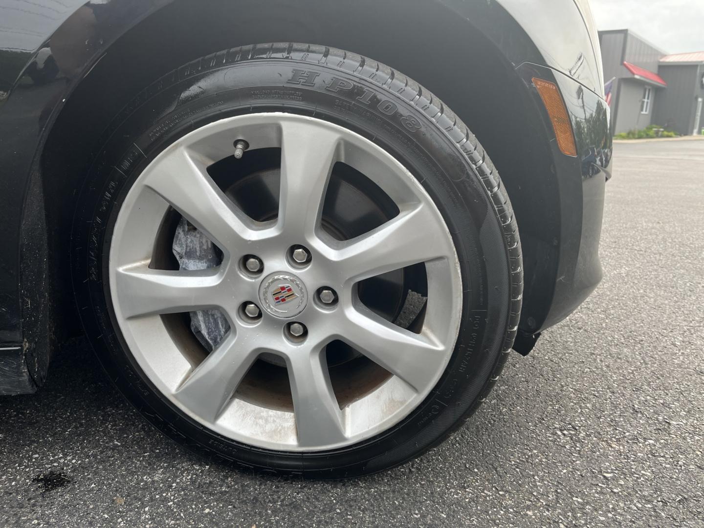2014 Black /Black Cadillac ATS 2.0L Base AWD (1G6AG5RX5E0) with an 2.0L I4 DOHC 16V TURBO engine, Automatic transmission, located at 11115 Chardon Rd. , Chardon, OH, 44024, (440) 214-9705, 41.580246, -81.241943 - 2014 Cadillac ATS AWD – Sporty Luxury Sedan with Turbo Power and Premium Refinement! This 2014 Cadillac ATS AWD is a sharp, performance-oriented luxury sedan that delivers an engaging drive with upscale comfort. Powered by a responsive 2.0L Turbocharged I4 engine paired with a smooth 6-speed auto - Photo#4