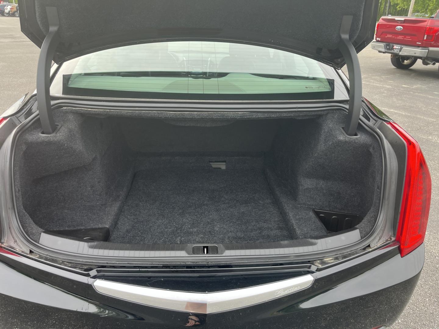 2014 Black /Black Cadillac ATS 2.0L Base AWD (1G6AG5RX5E0) with an 2.0L I4 DOHC 16V TURBO engine, Automatic transmission, located at 11115 Chardon Rd. , Chardon, OH, 44024, (440) 214-9705, 41.580246, -81.241943 - 2014 Cadillac ATS AWD – Sporty Luxury Sedan with Turbo Power and Premium Refinement! This 2014 Cadillac ATS AWD is a sharp, performance-oriented luxury sedan that delivers an engaging drive with upscale comfort. Powered by a responsive 2.0L Turbocharged I4 engine paired with a smooth 6-speed auto - Photo#13