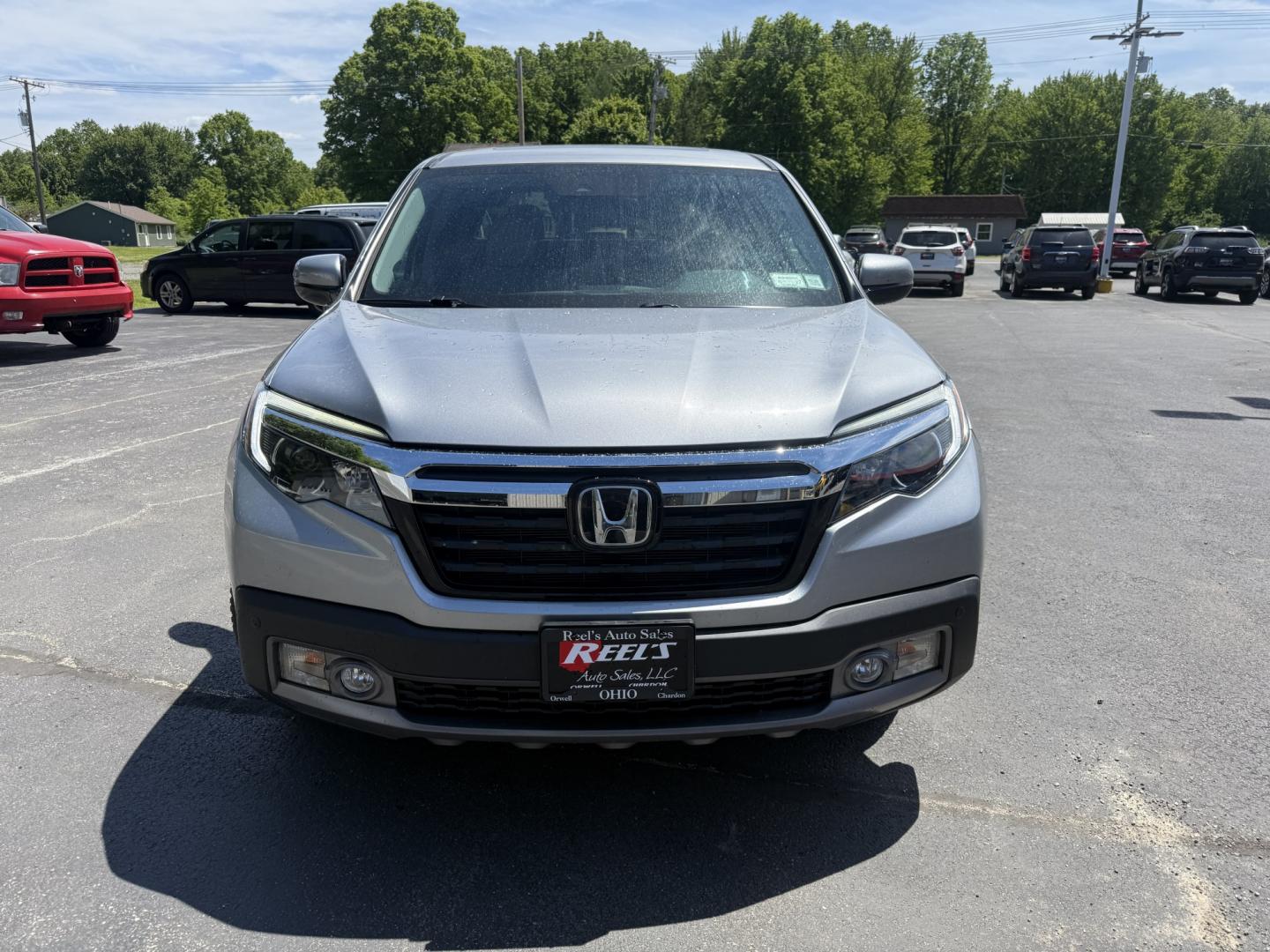 2018 Silver /Gray Honda Ridgeline RTL-E AWD (5FPYK3F79JB) with an 3.5L V6 SOHC 24V engine, Automatic transmission, located at 547 E. Main St., Orwell, OH, 44076, (440) 437-5893, 41.535435, -80.847855 - 2018 Honda Ridgeline RTL-E AWD – Premium Mid-Size Truck with Leather, Strong Towing, and Loaded Features! This sharp 2018 Honda Ridgeline RTL-E AWD is a refined and capable truck that combines car-like comfort with real truck utility. Powered by Honda’s smooth 3.5L Earth Dreams V6 engine paired - Photo#1