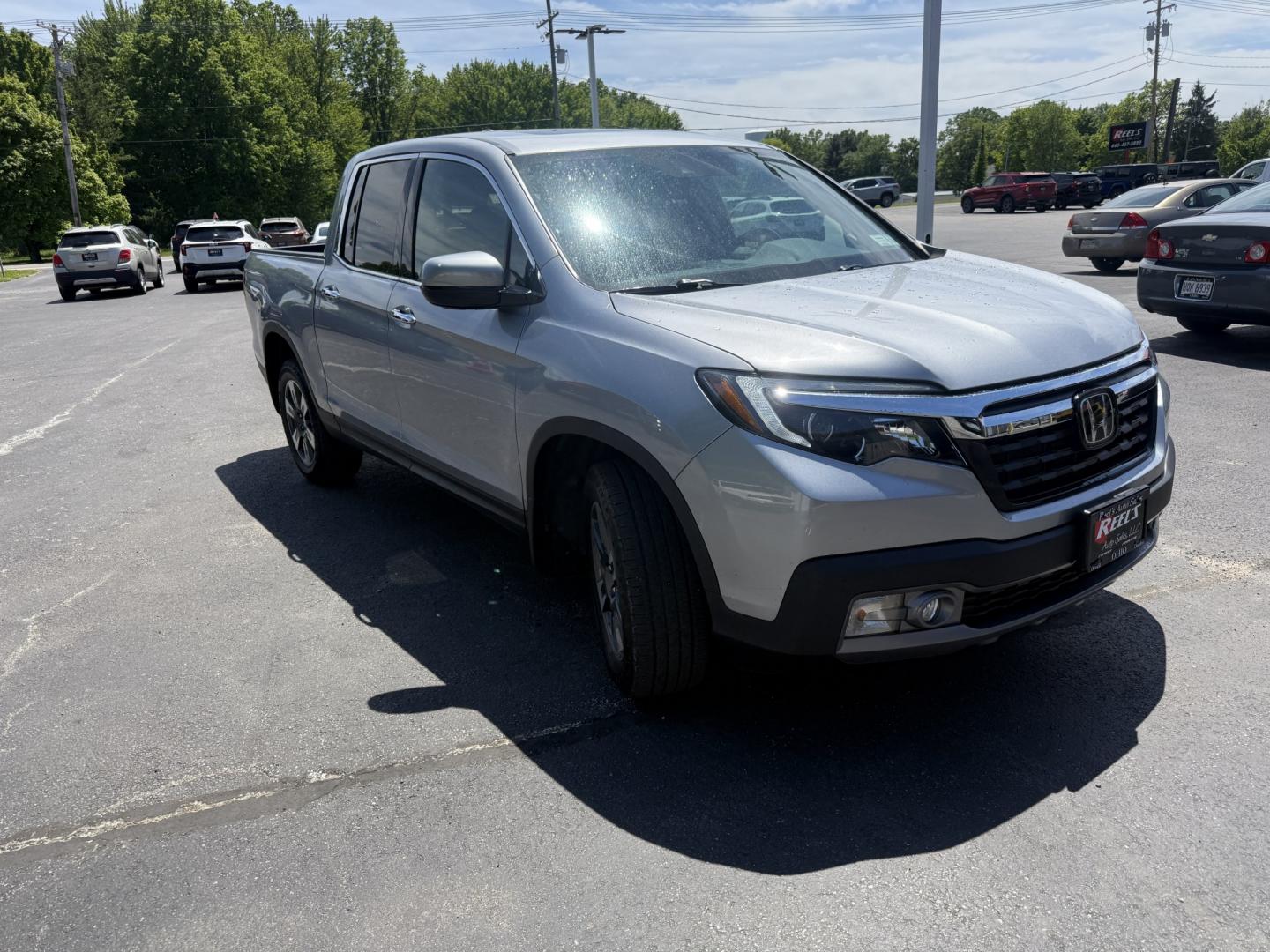 2018 Silver /Gray Honda Ridgeline RTL-E AWD (5FPYK3F79JB) with an 3.5L V6 SOHC 24V engine, Automatic transmission, located at 547 E. Main St., Orwell, OH, 44076, (440) 437-5893, 41.535435, -80.847855 - 2018 Honda Ridgeline RTL-E AWD – Premium Mid-Size Truck with Leather, Strong Towing, and Loaded Features! This sharp 2018 Honda Ridgeline RTL-E AWD is a refined and capable truck that combines car-like comfort with real truck utility. Powered by Honda’s smooth 3.5L Earth Dreams V6 engine paired - Photo#2
