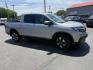2018 Silver /Gray Honda Ridgeline RTL-E AWD (5FPYK3F79JB) with an 3.5L V6 SOHC 24V engine, Automatic transmission, located at 547 E. Main St., Orwell, OH, 44076, (440) 437-5893, 41.535435, -80.847855 - 2018 Honda Ridgeline RTL-E AWD – Premium Mid-Size Truck with Leather, Strong Towing, and Loaded Features! This sharp 2018 Honda Ridgeline RTL-E AWD is a refined and capable truck that combines car-like comfort with real truck utility. Powered by Honda’s smooth 3.5L Earth Dreams V6 engine paired - Photo#3