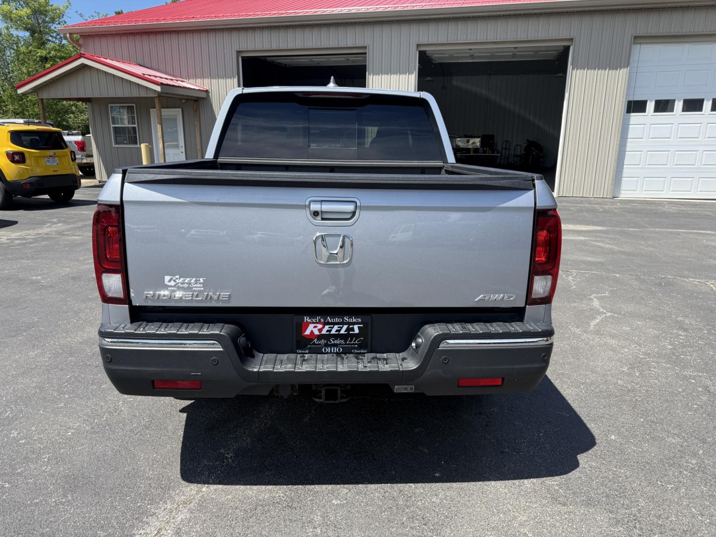 2018 Silver /Gray Honda Ridgeline RTL-E AWD (5FPYK3F79JB) with an 3.5L V6 SOHC 24V engine, Automatic transmission, located at 547 E. Main St., Orwell, OH, 44076, (440) 437-5893, 41.535435, -80.847855 - 2018 Honda Ridgeline RTL-E AWD – Premium Mid-Size Truck with Leather, Strong Towing, and Loaded Features! This sharp 2018 Honda Ridgeline RTL-E AWD is a refined and capable truck that combines car-like comfort with real truck utility. Powered by Honda’s smooth 3.5L Earth Dreams V6 engine paired - Photo#32