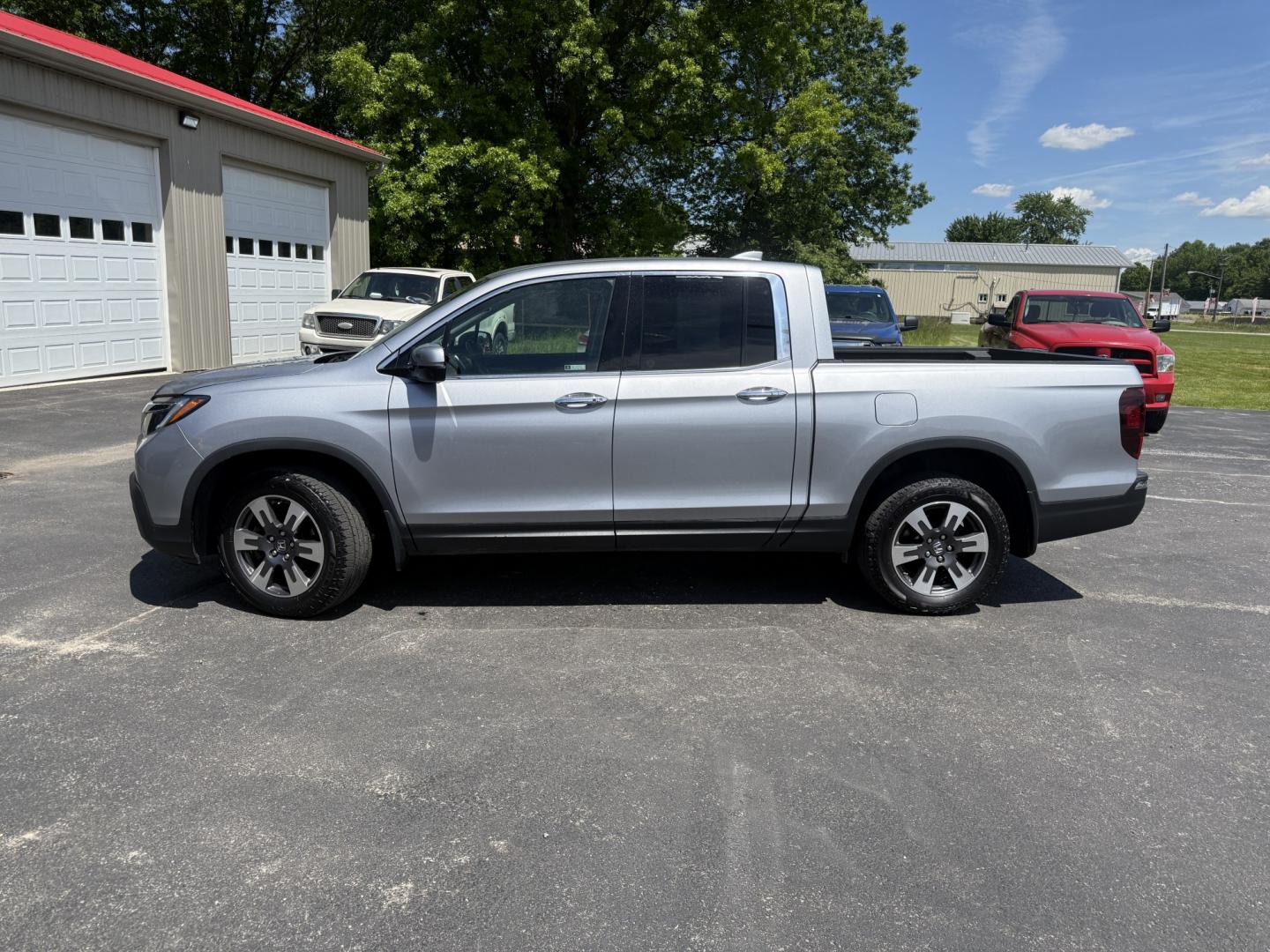 2018 Silver /Gray Honda Ridgeline RTL-E AWD (5FPYK3F79JB) with an 3.5L V6 SOHC 24V engine, Automatic transmission, located at 547 E. Main St., Orwell, OH, 44076, (440) 437-5893, 41.535435, -80.847855 - 2018 Honda Ridgeline RTL-E AWD – Premium Mid-Size Truck with Leather, Strong Towing, and Loaded Features! This sharp 2018 Honda Ridgeline RTL-E AWD is a refined and capable truck that combines car-like comfort with real truck utility. Powered by Honda’s smooth 3.5L Earth Dreams V6 engine paired - Photo#36