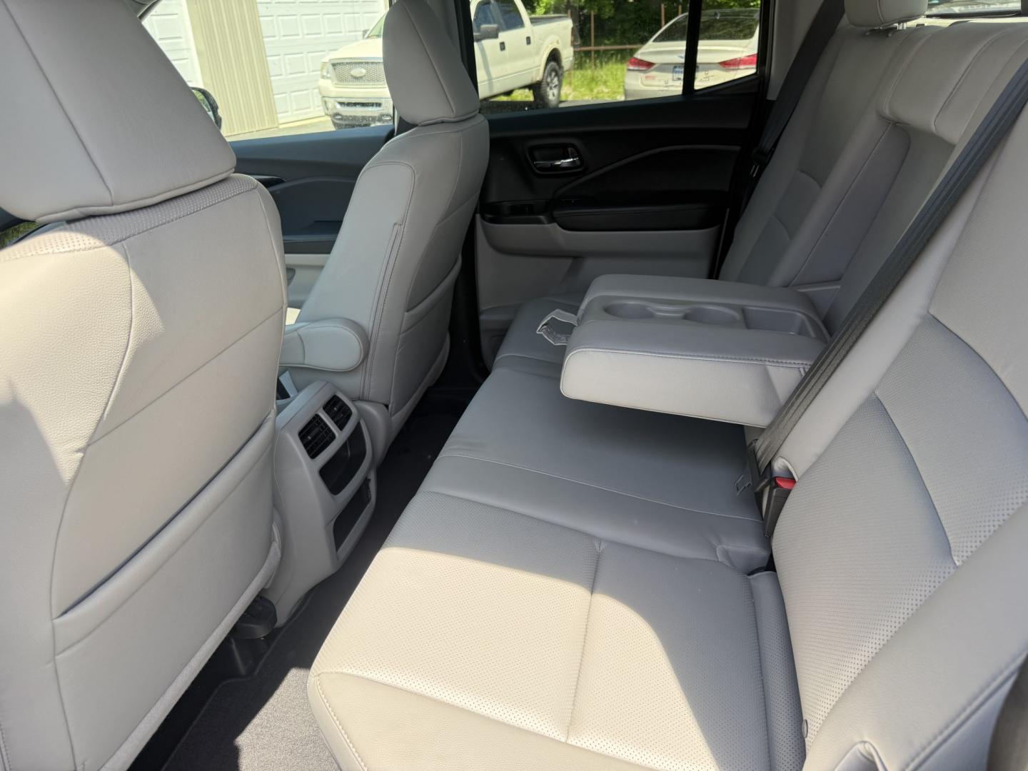 2018 Silver /Gray Honda Ridgeline RTL-E AWD (5FPYK3F79JB) with an 3.5L V6 SOHC 24V engine, Automatic transmission, located at 547 E. Main St., Orwell, OH, 44076, (440) 437-5893, 41.535435, -80.847855 - 2018 Honda Ridgeline RTL-E AWD – Premium Mid-Size Truck with Leather, Strong Towing, and Loaded Features! This sharp 2018 Honda Ridgeline RTL-E AWD is a refined and capable truck that combines car-like comfort with real truck utility. Powered by Honda’s smooth 3.5L Earth Dreams V6 engine paired - Photo#26