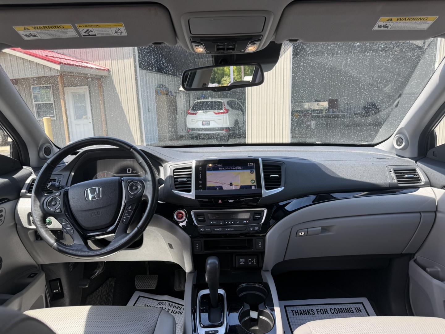 2018 Silver /Gray Honda Ridgeline RTL-E AWD (5FPYK3F79JB) with an 3.5L V6 SOHC 24V engine, Automatic transmission, located at 547 E. Main St., Orwell, OH, 44076, (440) 437-5893, 41.535435, -80.847855 - 2018 Honda Ridgeline RTL-E AWD – Premium Mid-Size Truck with Leather, Strong Towing, and Loaded Features! This sharp 2018 Honda Ridgeline RTL-E AWD is a refined and capable truck that combines car-like comfort with real truck utility. Powered by Honda’s smooth 3.5L Earth Dreams V6 engine paired - Photo#28