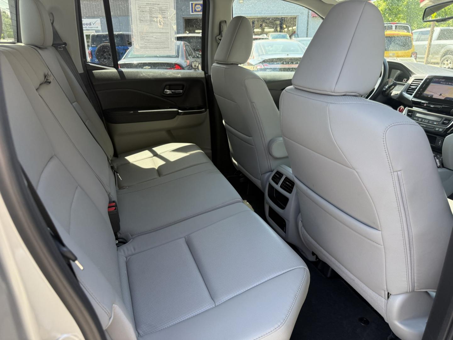 2018 Silver /Gray Honda Ridgeline RTL-E AWD (5FPYK3F79JB) with an 3.5L V6 SOHC 24V engine, Automatic transmission, located at 547 E. Main St., Orwell, OH, 44076, (440) 437-5893, 41.535435, -80.847855 - 2018 Honda Ridgeline RTL-E AWD – Premium Mid-Size Truck with Leather, Strong Towing, and Loaded Features! This sharp 2018 Honda Ridgeline RTL-E AWD is a refined and capable truck that combines car-like comfort with real truck utility. Powered by Honda’s smooth 3.5L Earth Dreams V6 engine paired - Photo#40