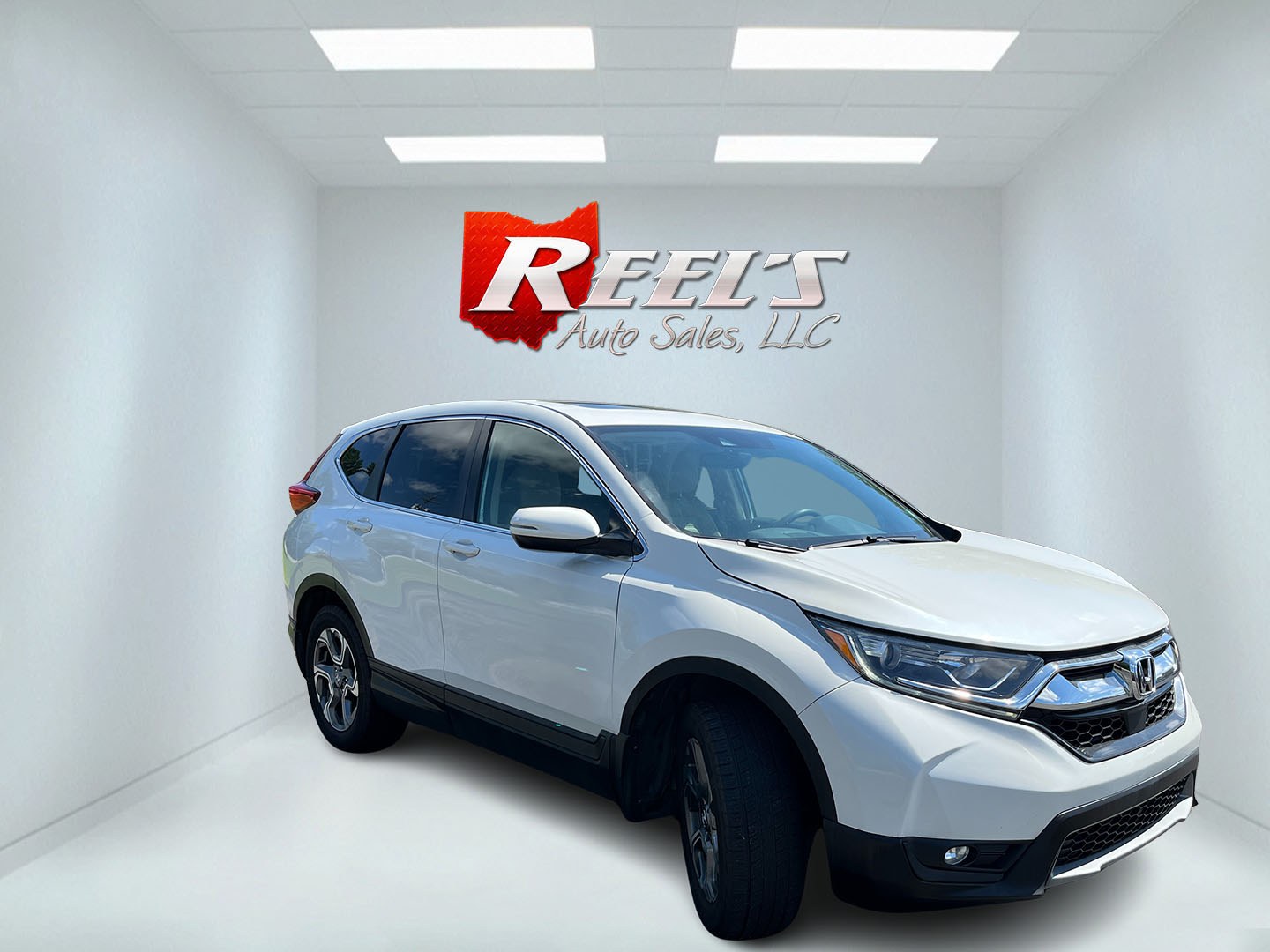 2018 White /Gray Honda CR-V EX AWD (2HKRW2H57JH) with an 1.5L I4 16V DOHC TURBO engine, Automatic transmission, located at 11115 Chardon Rd. , Chardon, OH, 44024, (440) 214-9705, 41.580246, -81.241943 - 2018 Honda CR-V EX AWD – Efficient Compact SUV with Everyday Comfort and Confidence If you want a compact SUV that balances efficiency, comfort, and all-weather capability, this 2018 Honda CR-V EX AWD is a practical choice. The 1.5L Turbocharged engine delivers responsive power and a strong 33 MP- Photo#2