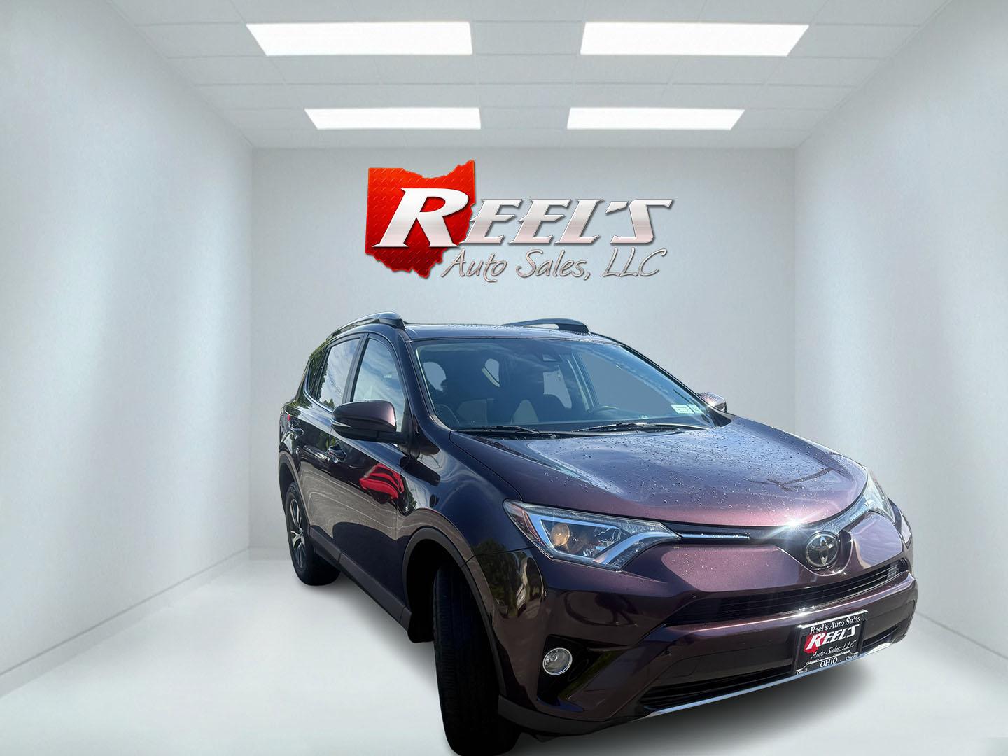 2018 Purple /Black Toyota RAV4 XLE AWD (2T3RFREV6JW) with an 2.5L I4 DOHC 16V engine, Automatic transmission, located at 547 E. Main St., Orwell, OH, 44076, (440) 437-5893, 41.535435, -80.847855 - 2018 Toyota RAV4 XLE AWD – Reliable, Efficient, and Loaded with Safety and Convenience! This clean 2018 Toyota RAV4 XLE AWD is a smart, well-rounded compact SUV that offers excellent reliability, strong value, and everyday practicality. Powered by a smooth 2.5L I4 engine paired with a responsive - Photo#2